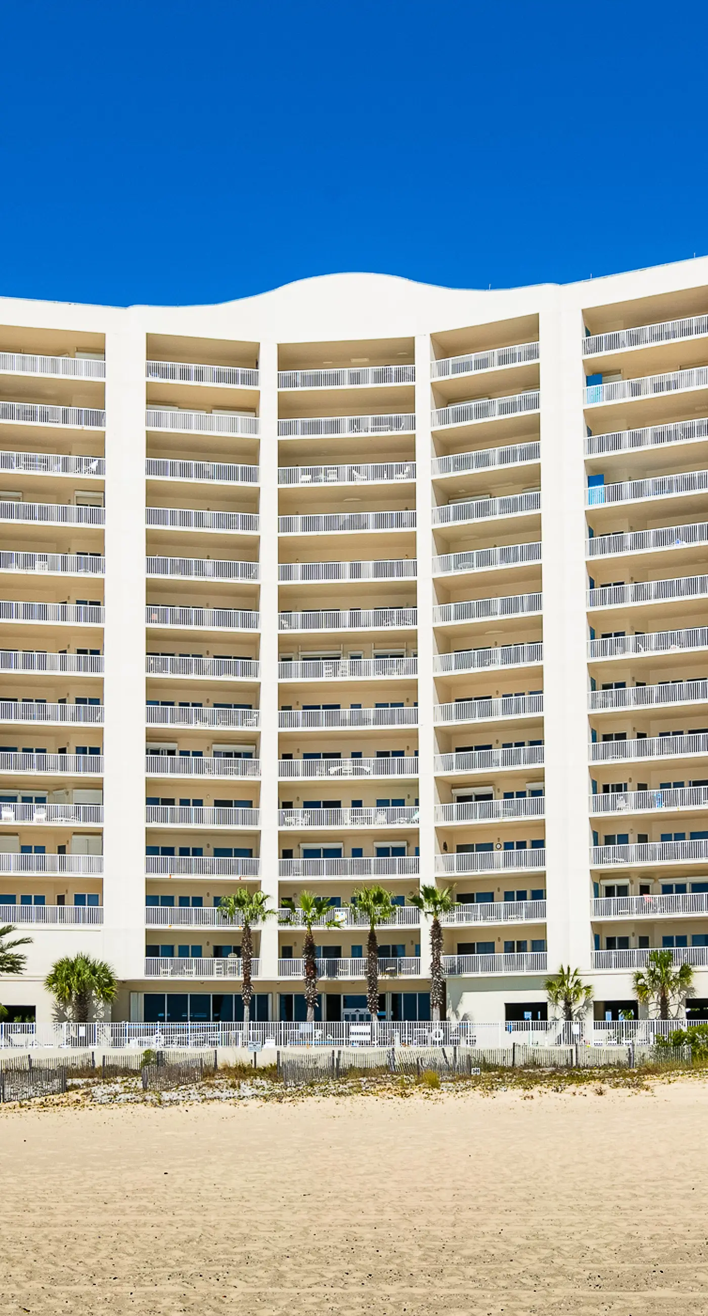 Upscale beachfront retreat w/private balcony, resort pool, sauna, & beach access