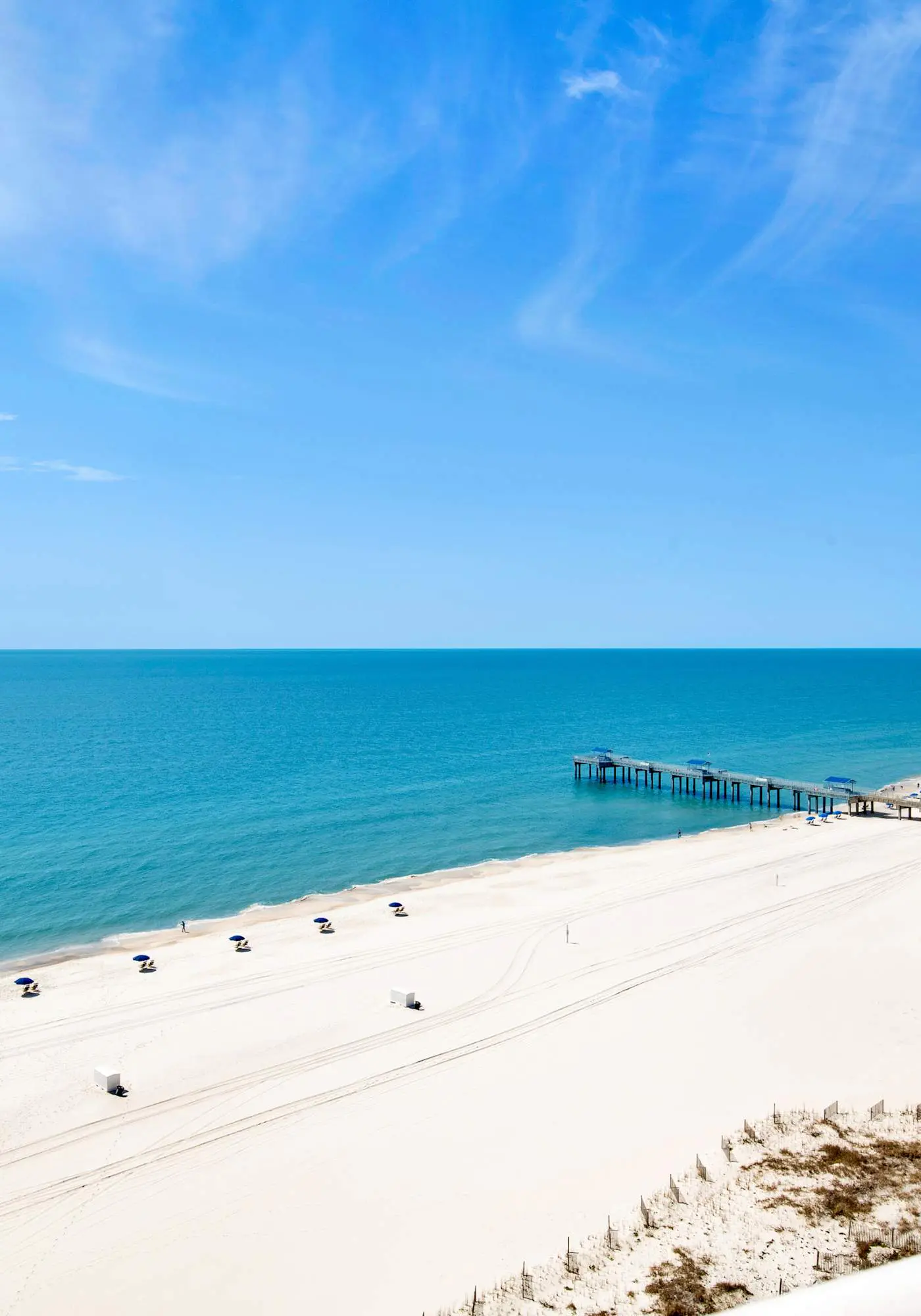 Upscale beachfront retreat w/private balcony, resort pool, sauna, & beach access