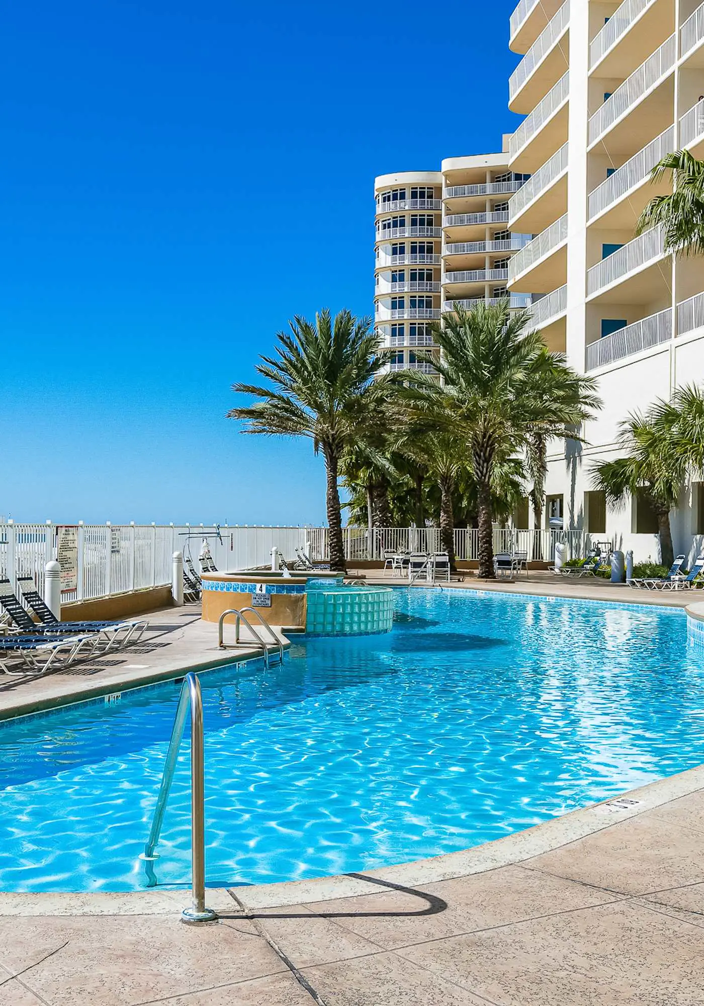 Upscale beachfront retreat w/private balcony, resort pool, sauna, & beach access