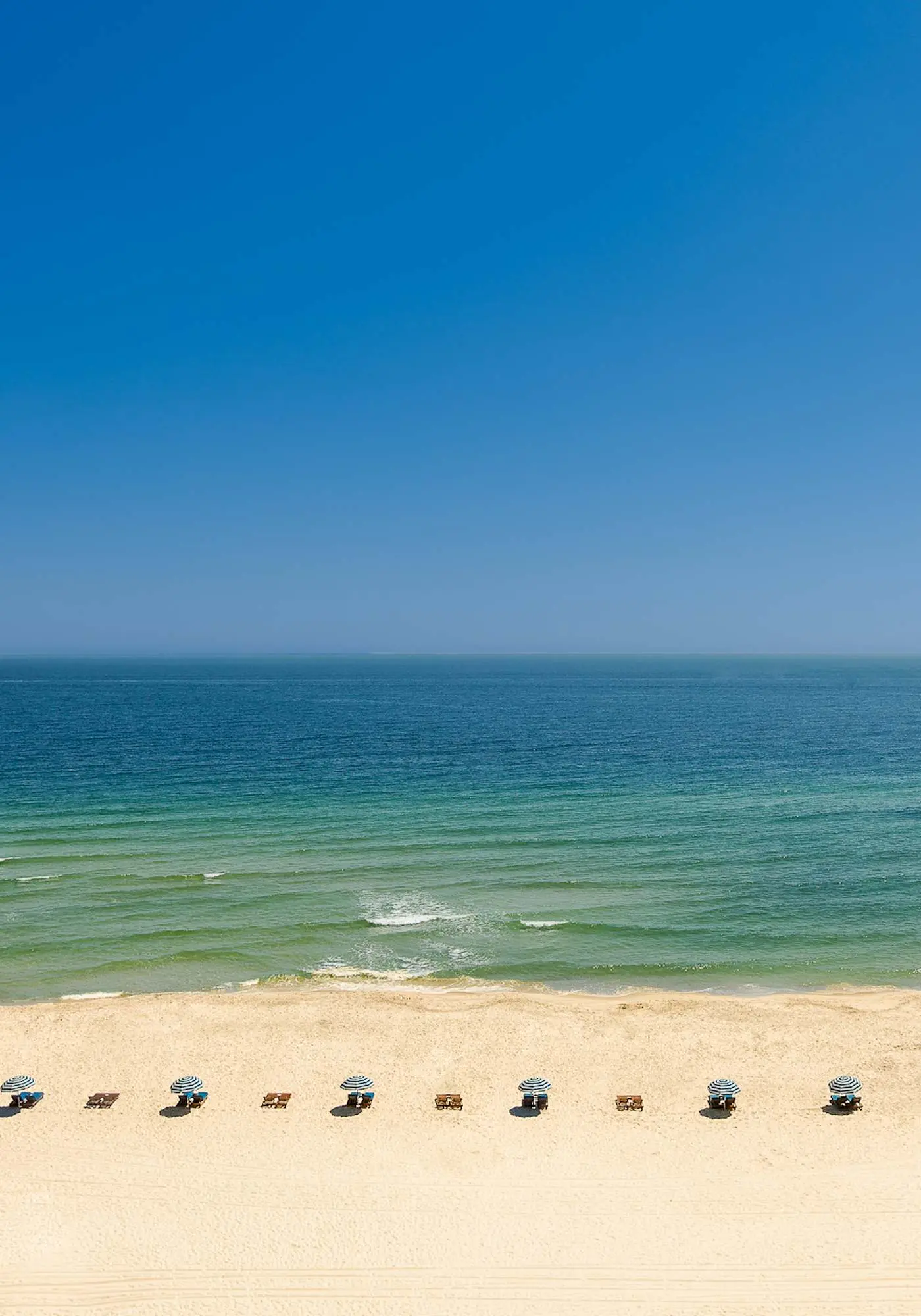 Upscale beachfront retreat w/private balcony, resort pool, sauna, & beach access