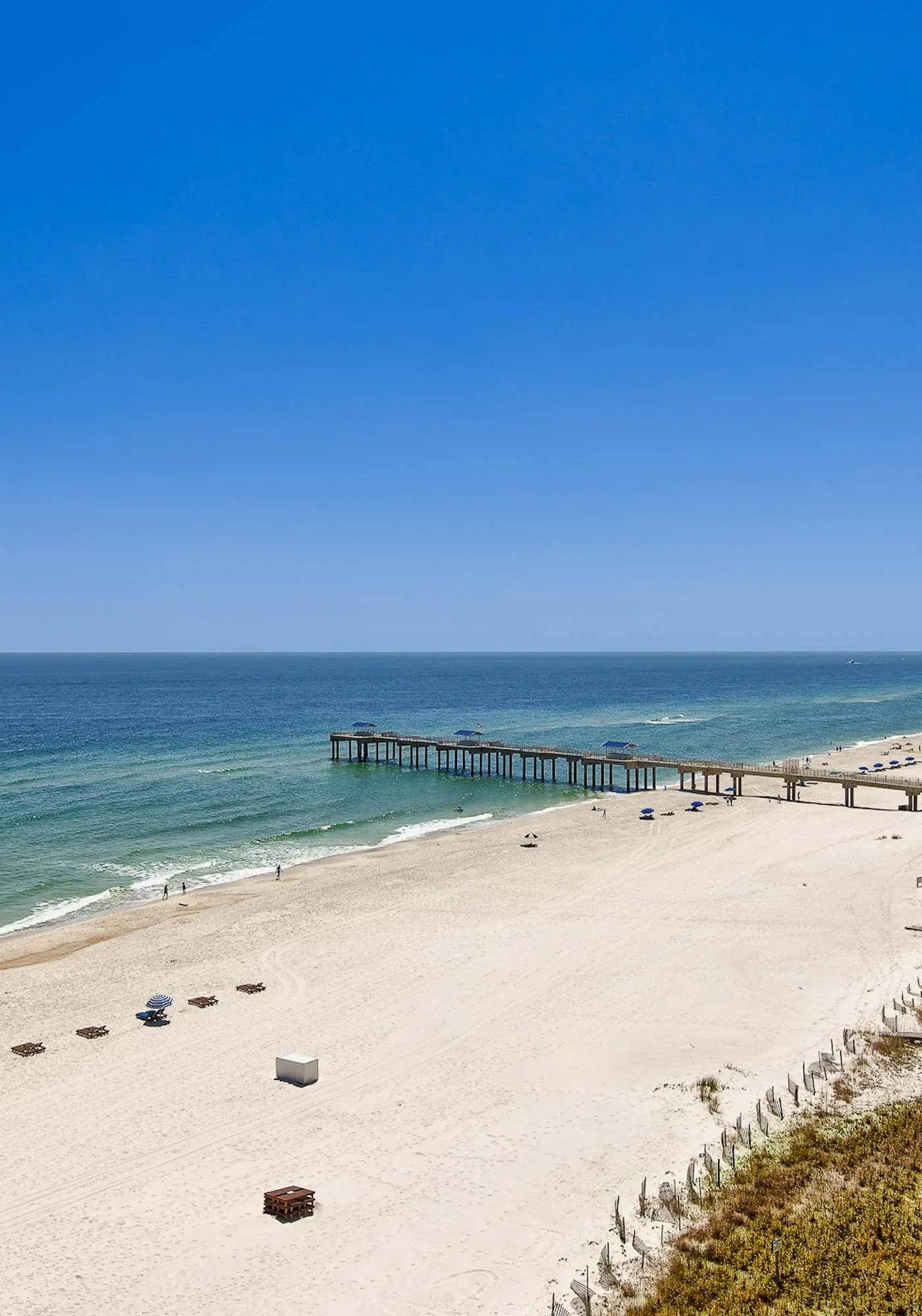 Upscale beachfront retreat w/private balcony, resort pool, sauna, & beach access