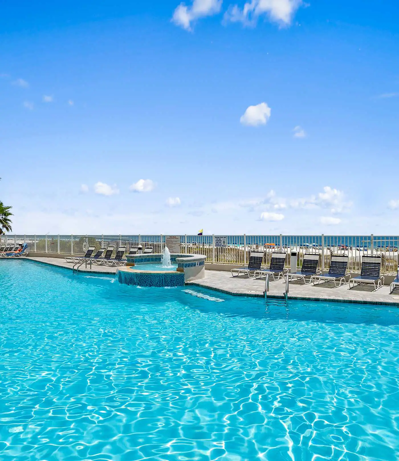 Upscale beachfront retreat w/private balcony, resort pool, sauna, & beach access
