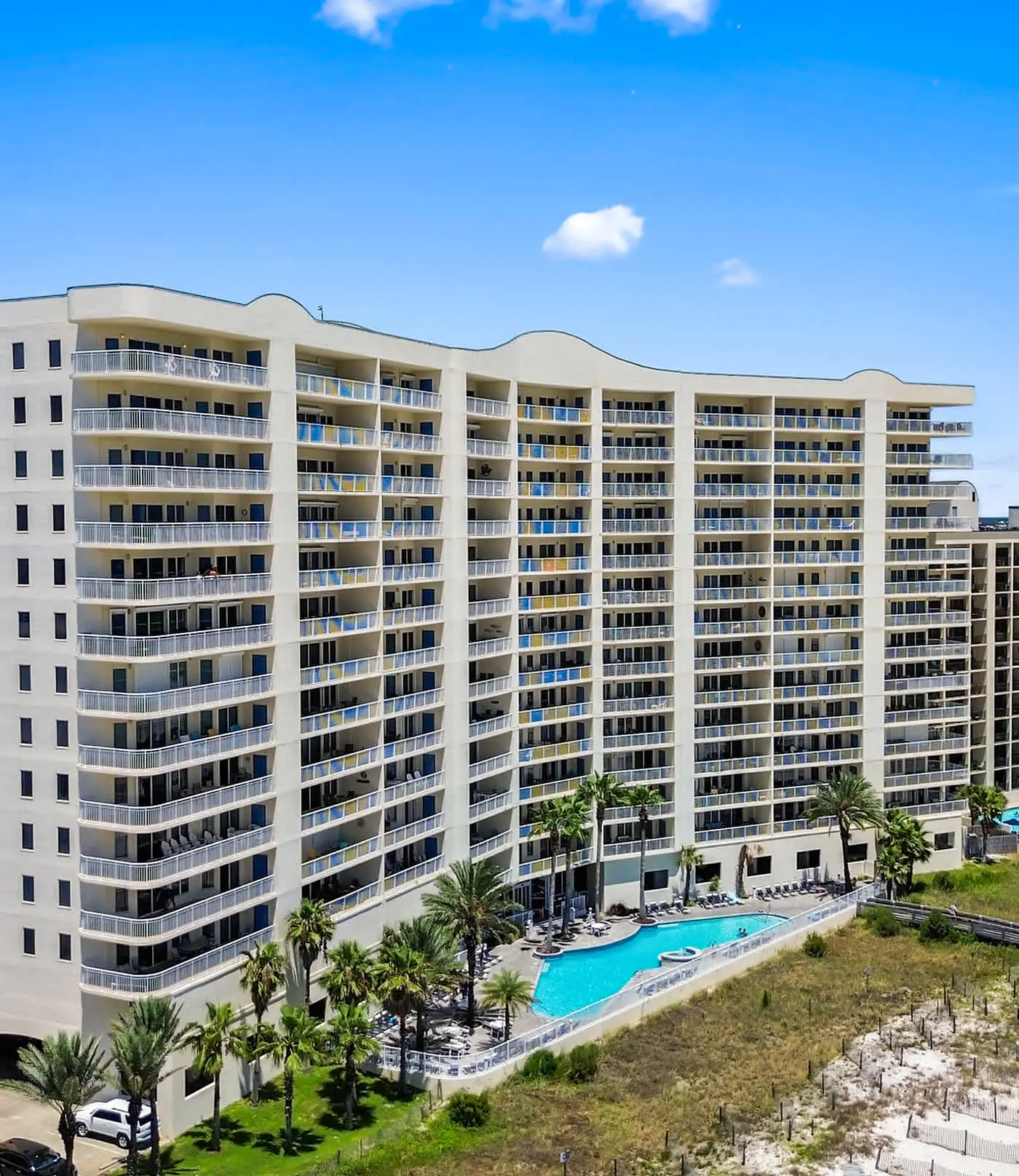 Upscale beachfront retreat w/private balcony, resort pool, sauna, & beach access