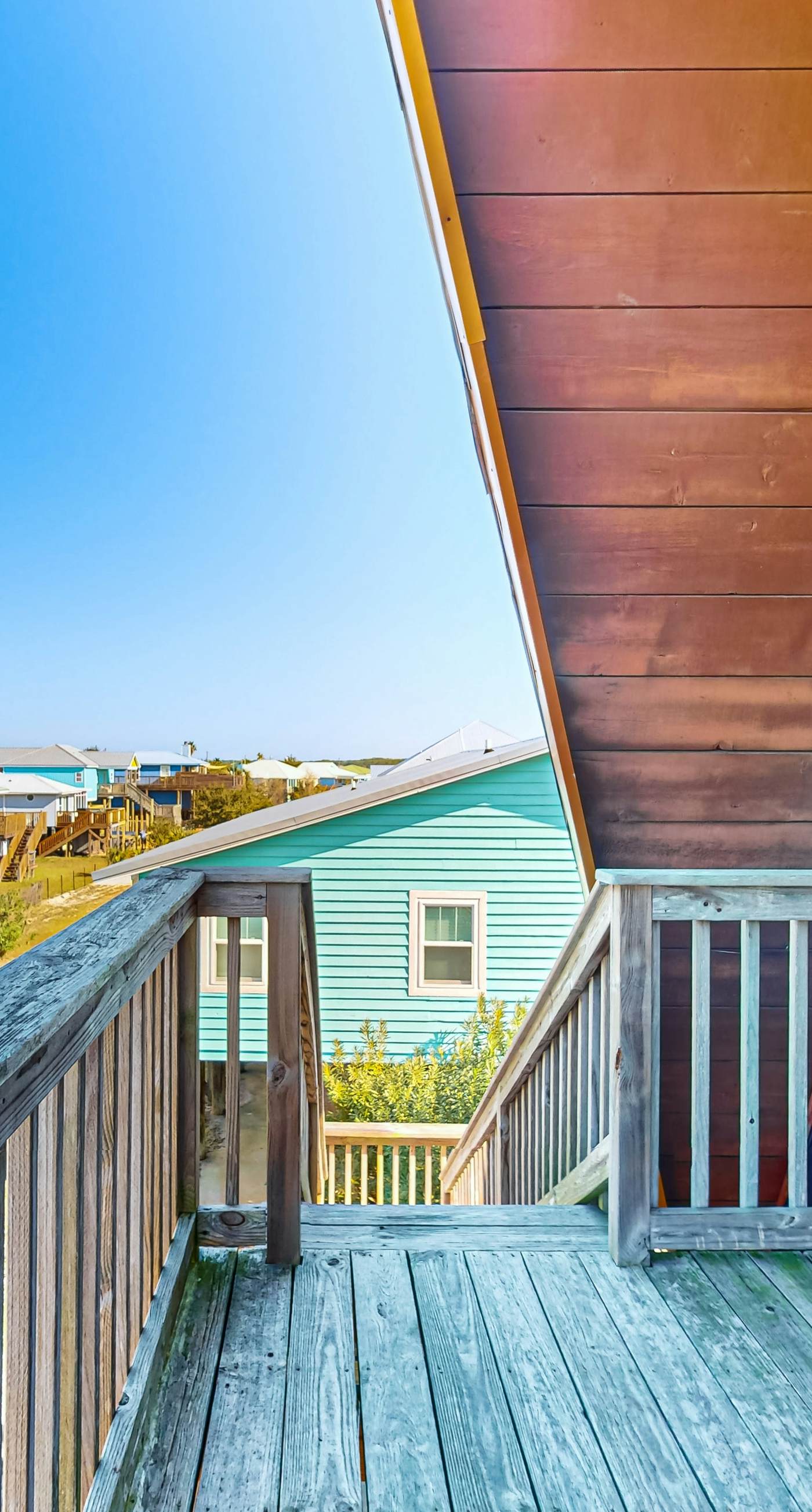 Unique beachside A-frame with porches, fantastic views & ocean access