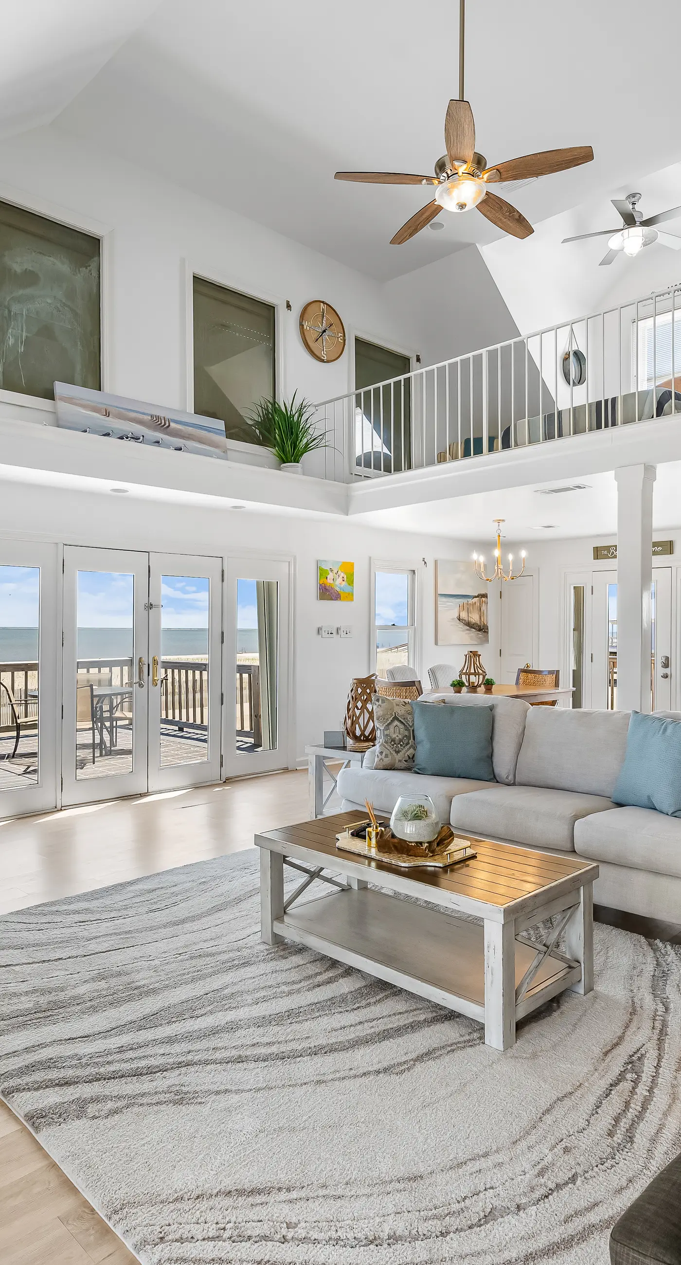 Dog-friendly beach house w/ stunning water views, wrap-around decks & a loft