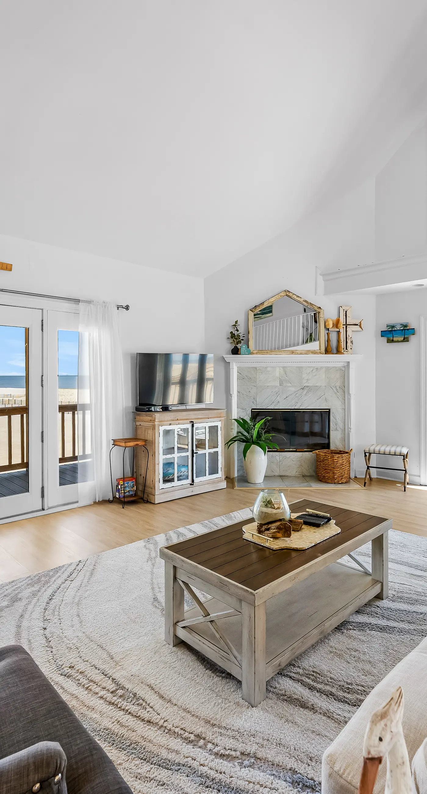 Dog-friendly beach house w/ stunning water views, wrap-around decks & a loft