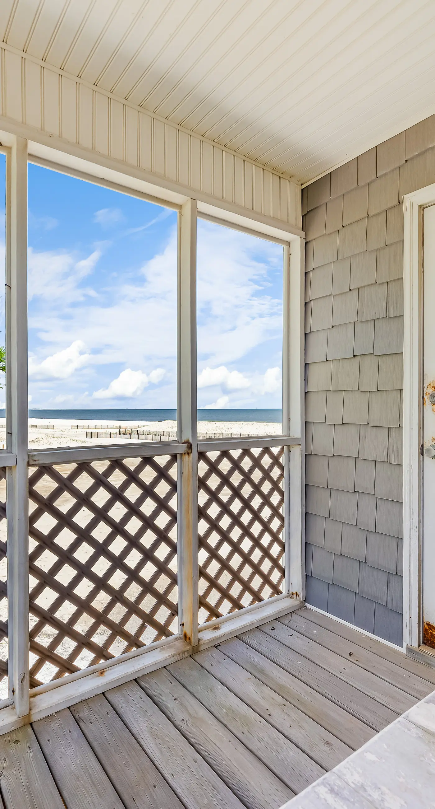 Dog-friendly beach house w/ stunning water views, wrap-around decks & a loft