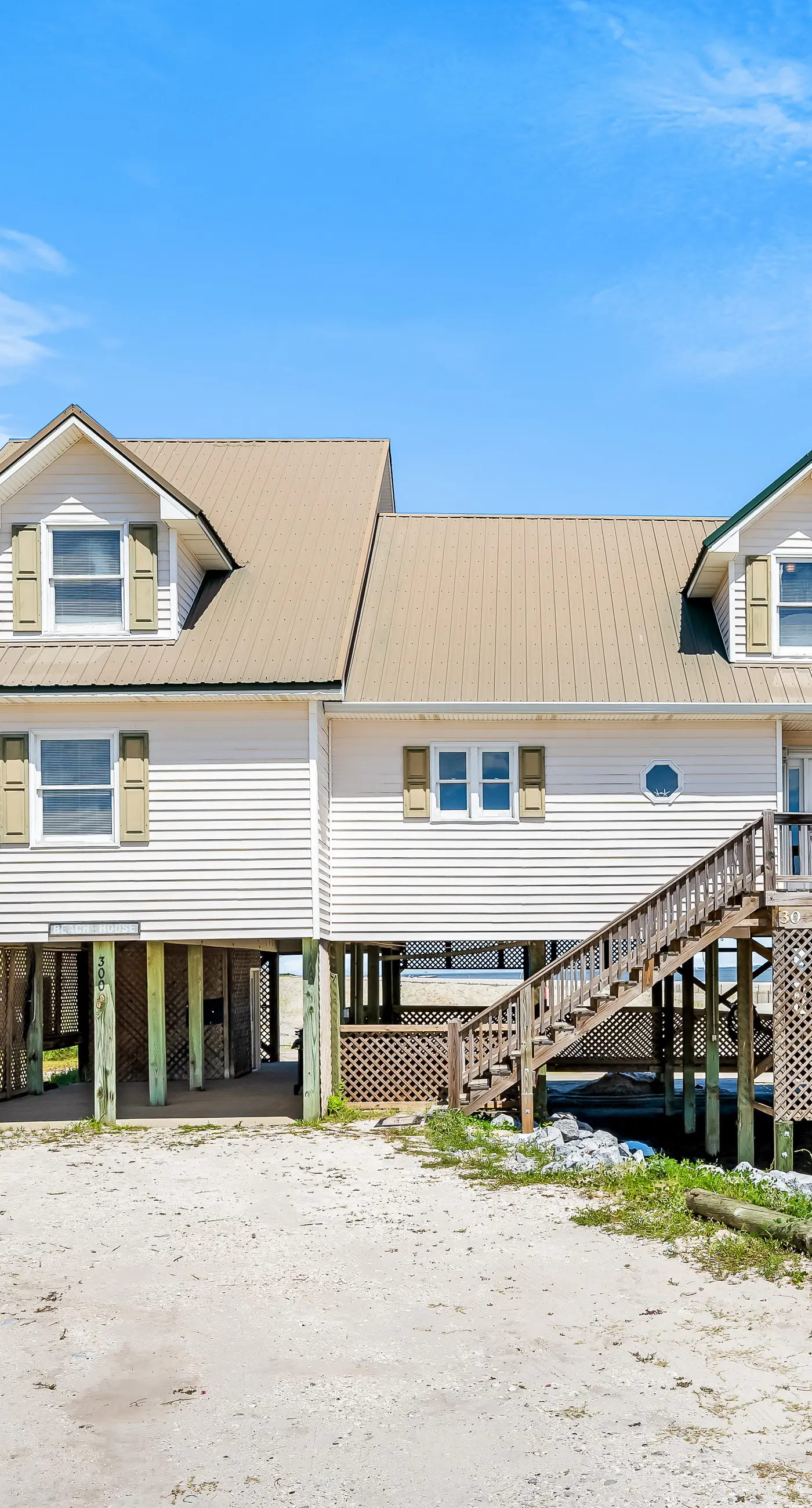 Dog-friendly beach house w/ stunning water views, wrap-around decks & a loft