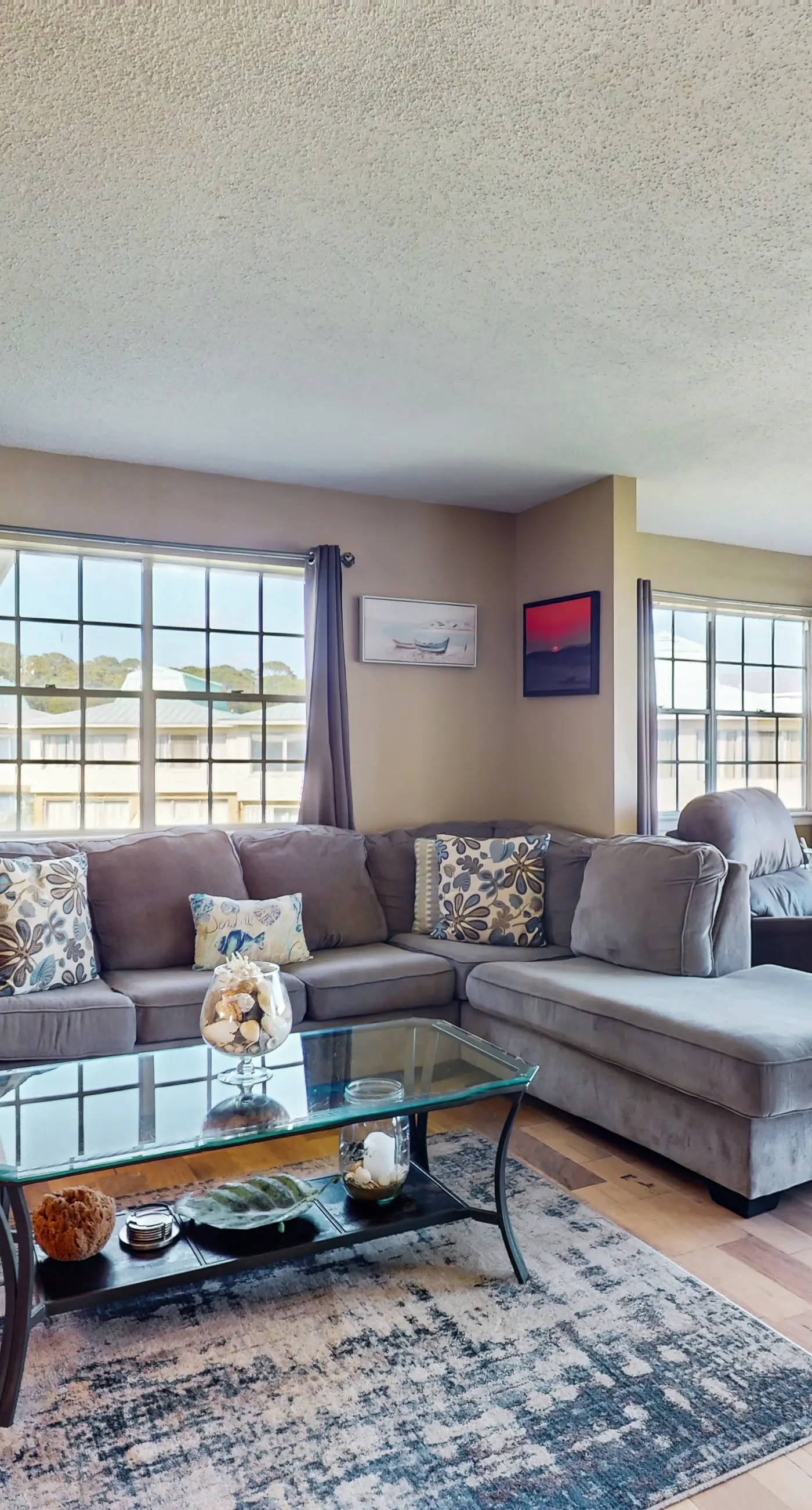 Family-friendly, beachfront getaway with a stainless kitchen & shared pool