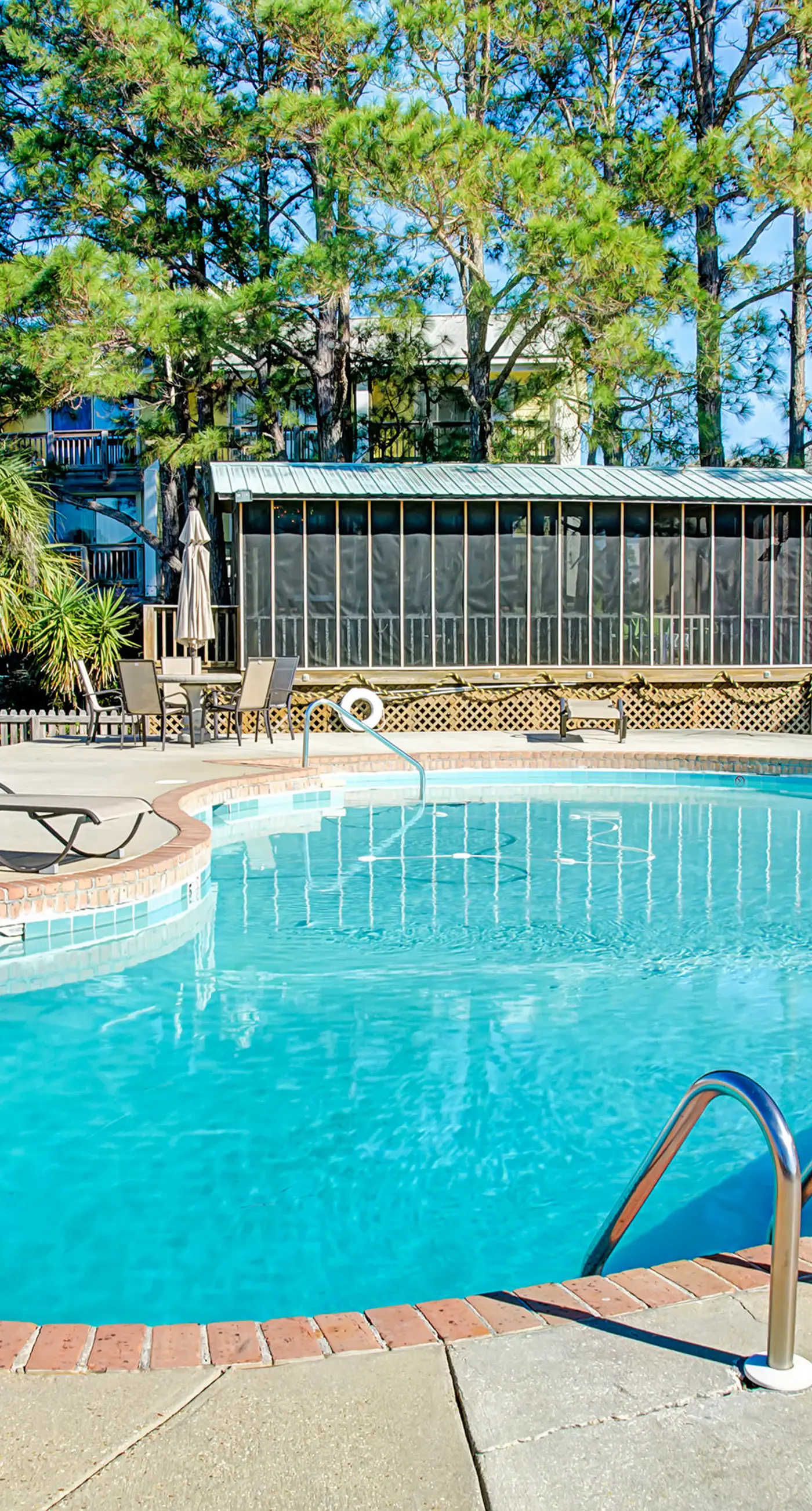 Family-friendly, beachfront getaway with a stainless kitchen & shared pool