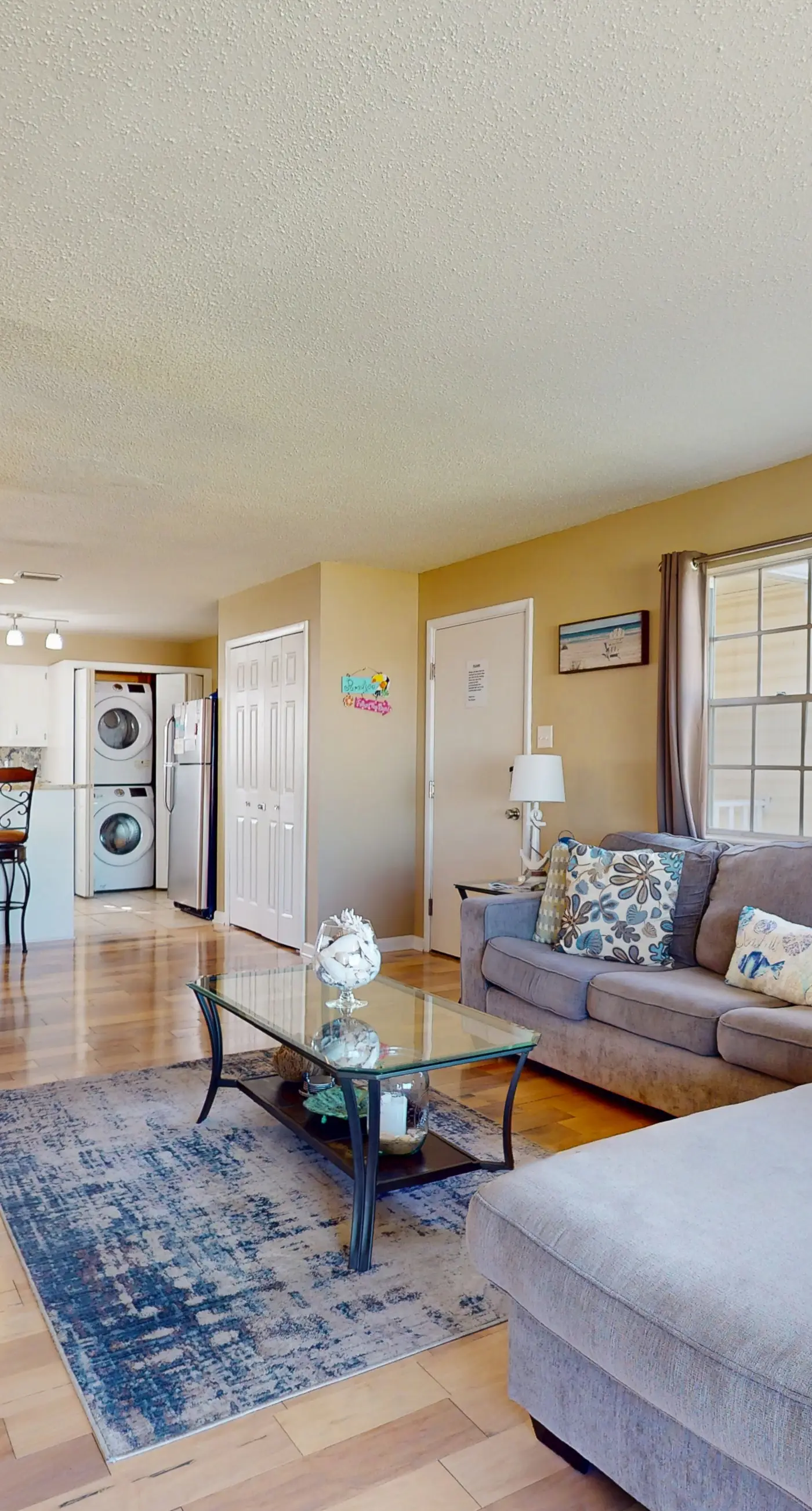 Family-friendly, beachfront getaway with a stainless kitchen & shared pool