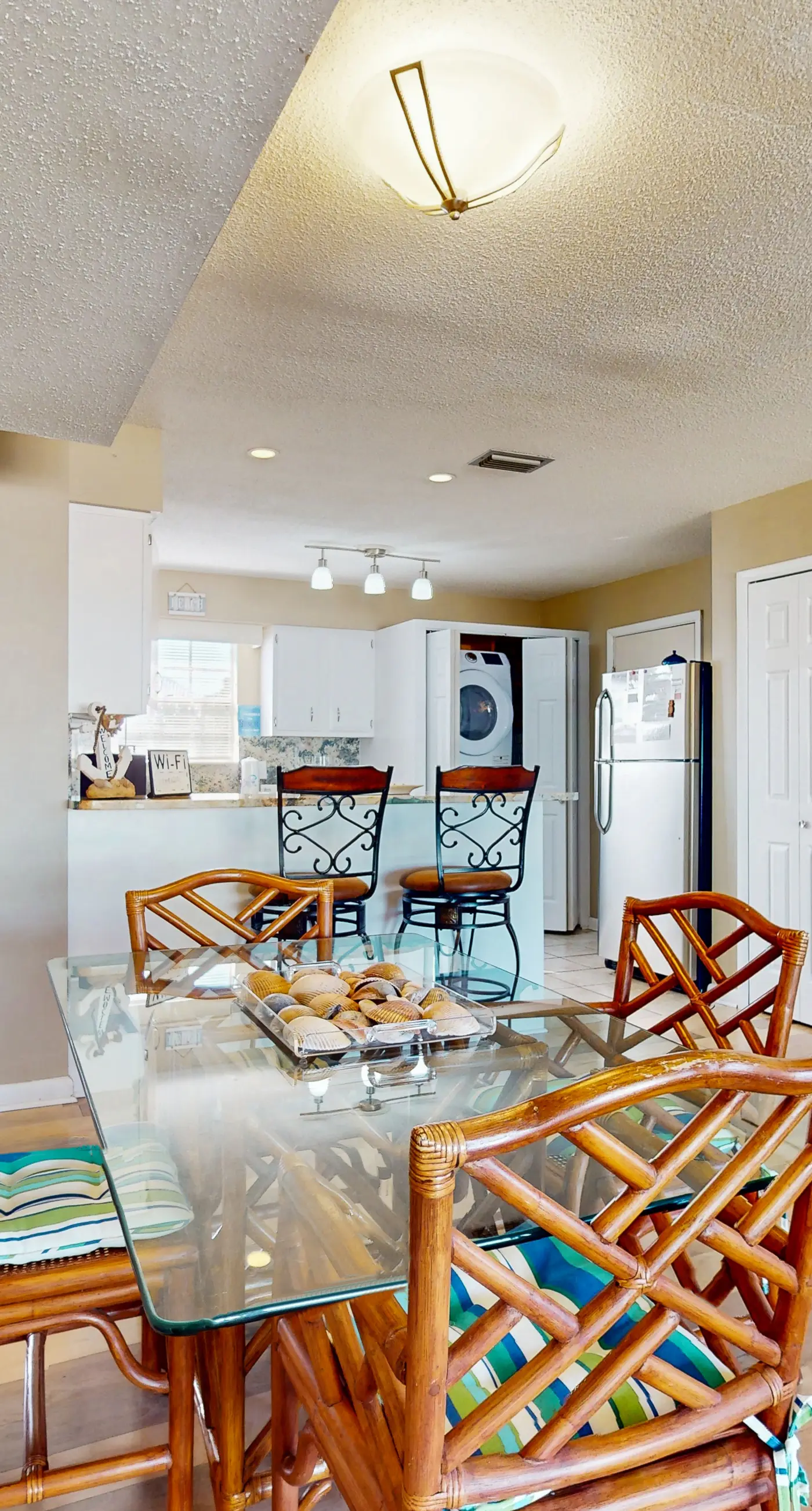 Family-friendly, beachfront getaway with a stainless kitchen & shared pool