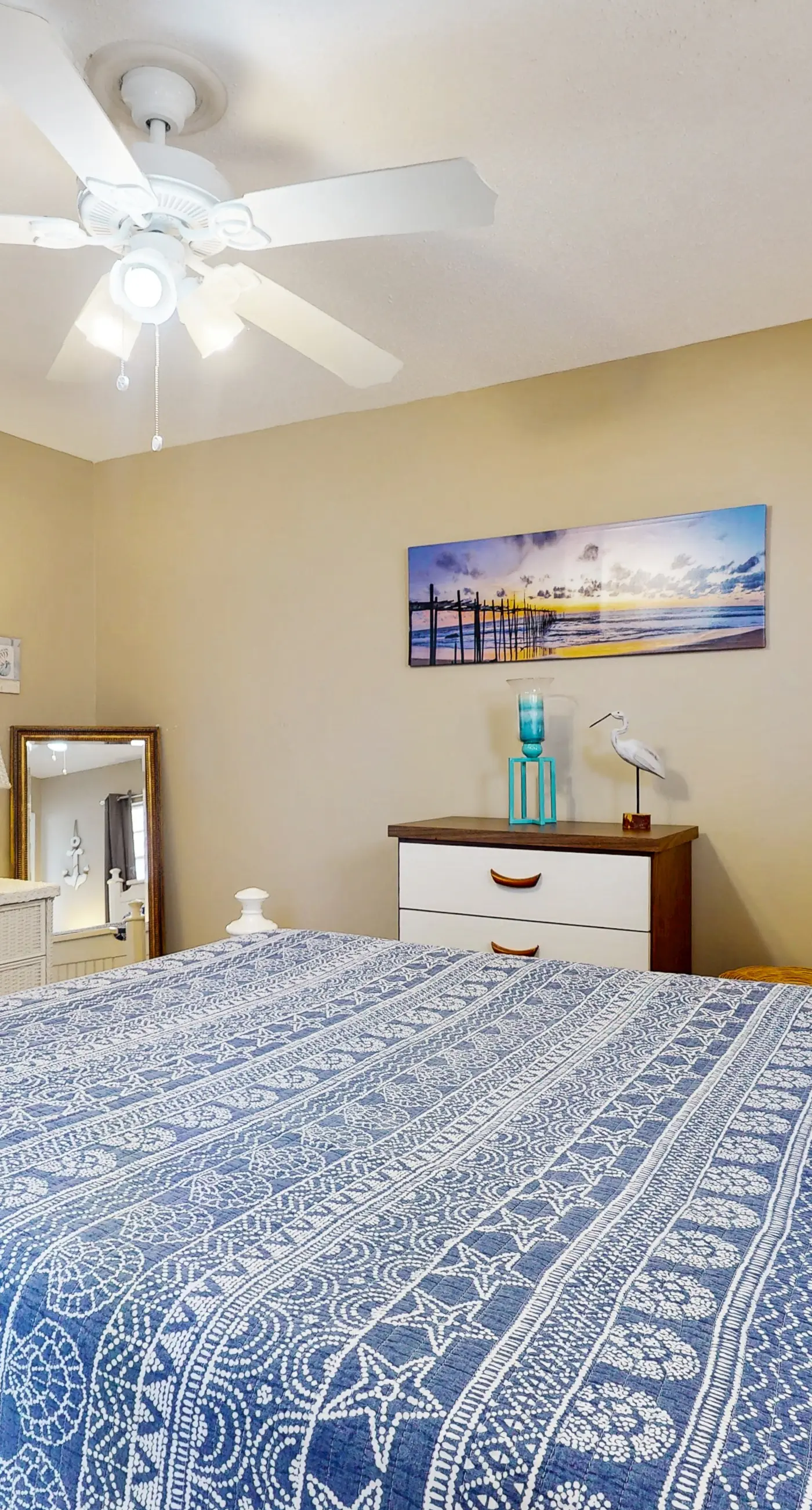 Family-friendly, beachfront getaway with a stainless kitchen & shared pool