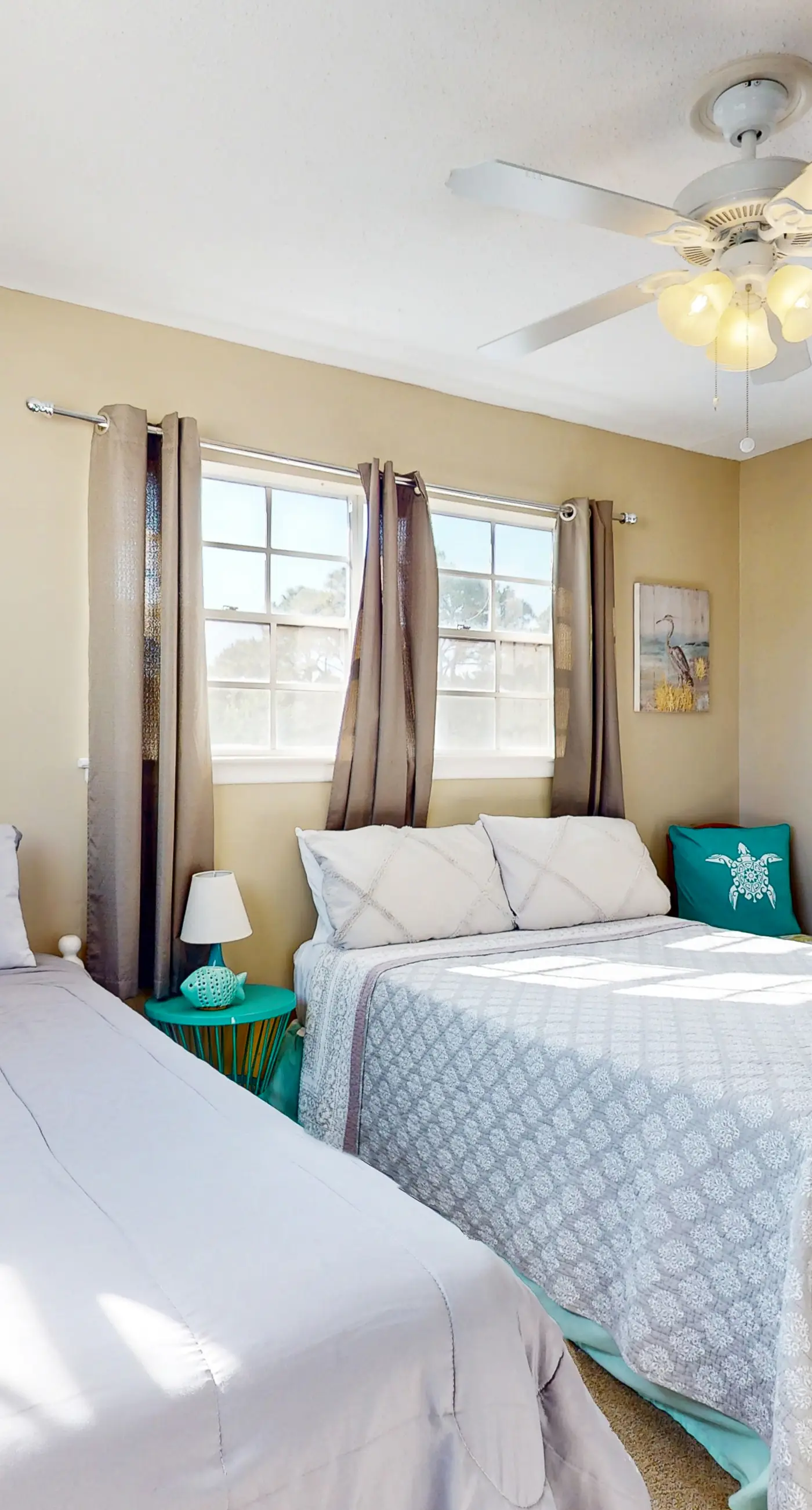 Family-friendly, beachfront getaway with a stainless kitchen & shared pool