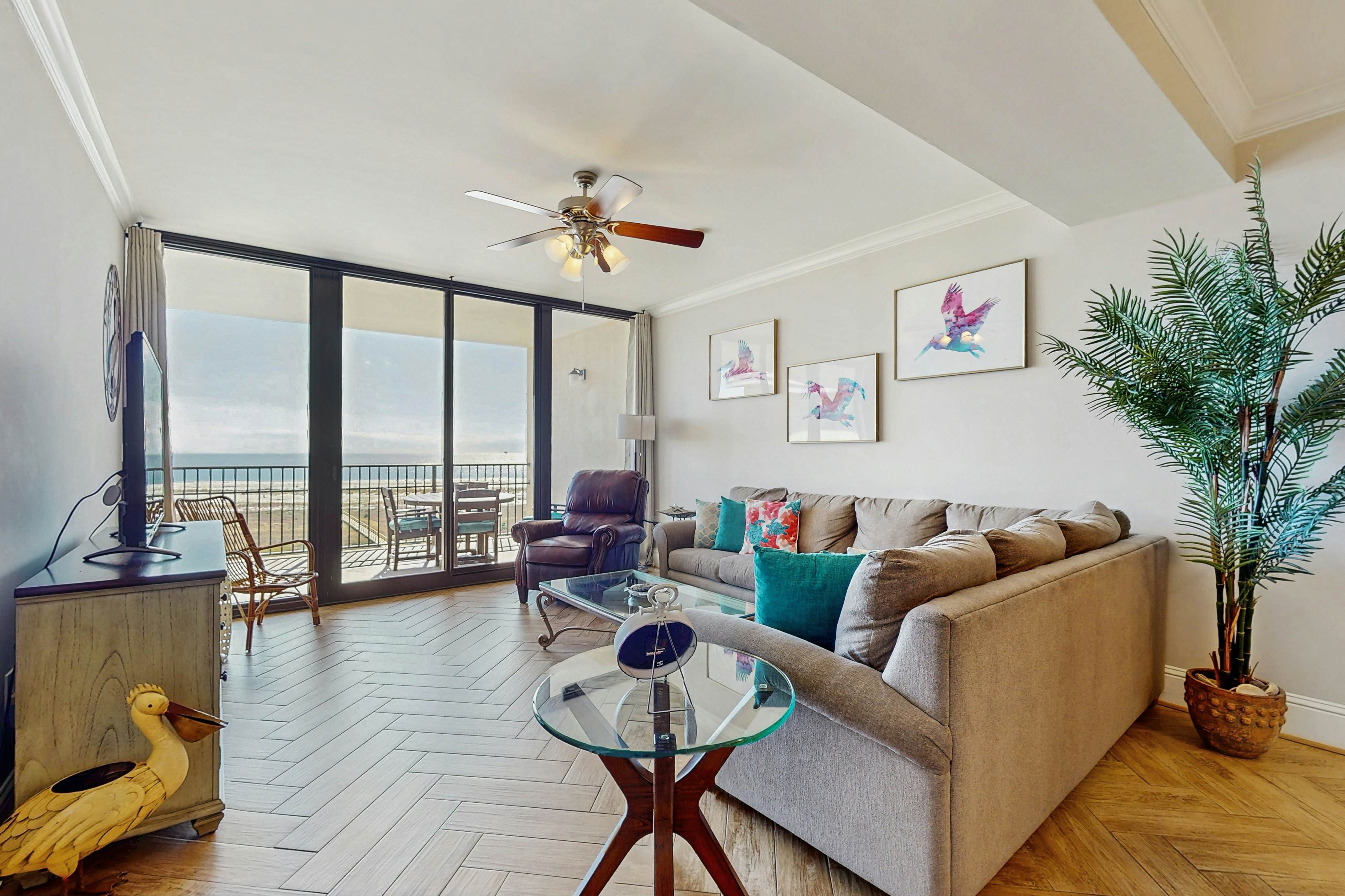 Bright & beachy waterfront condo with pools, tennis, gym, spacious balcony & W/D