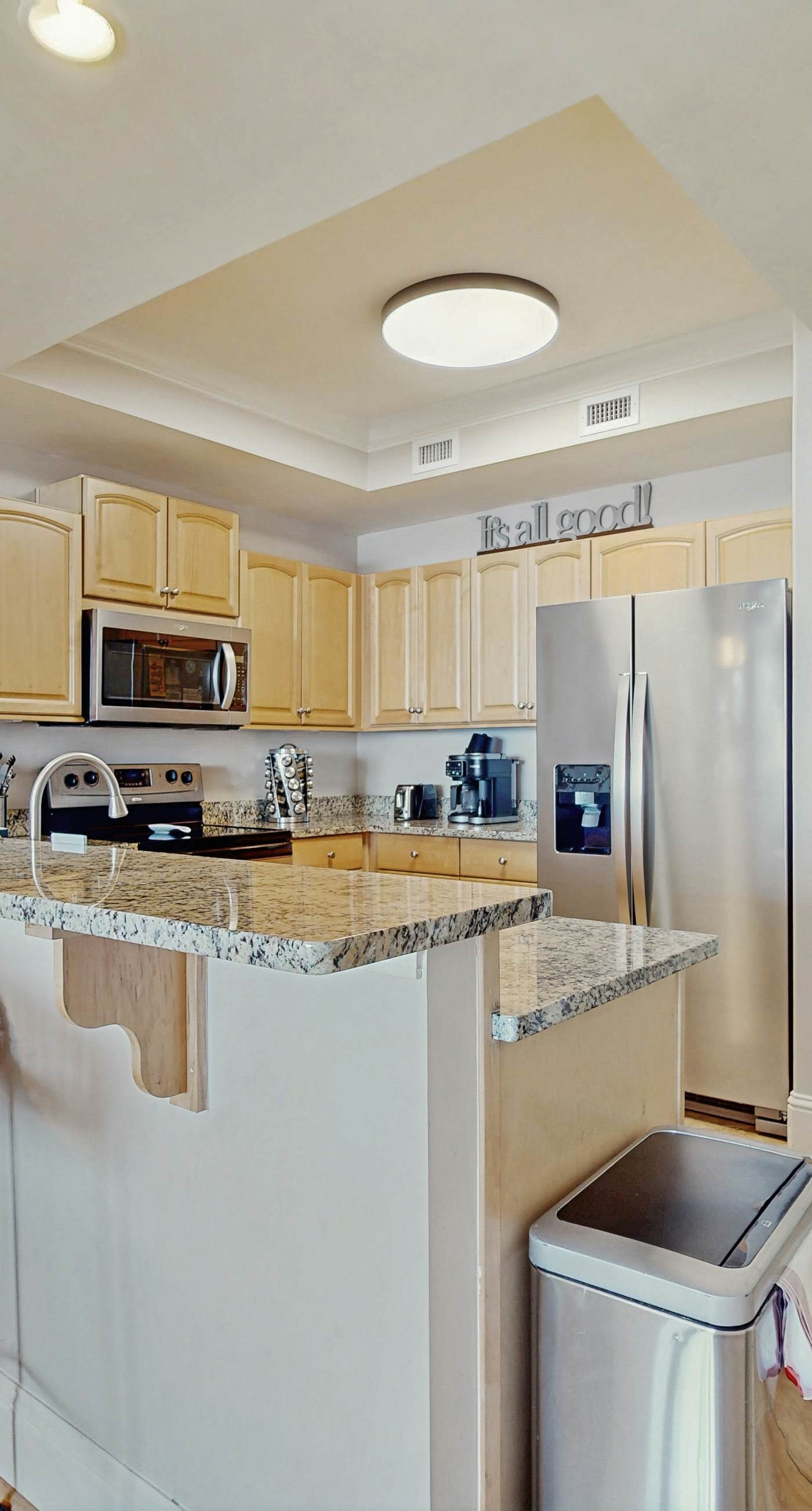 Bright & beachy waterfront condo with pools, tennis, gym, spacious balcony & W/D