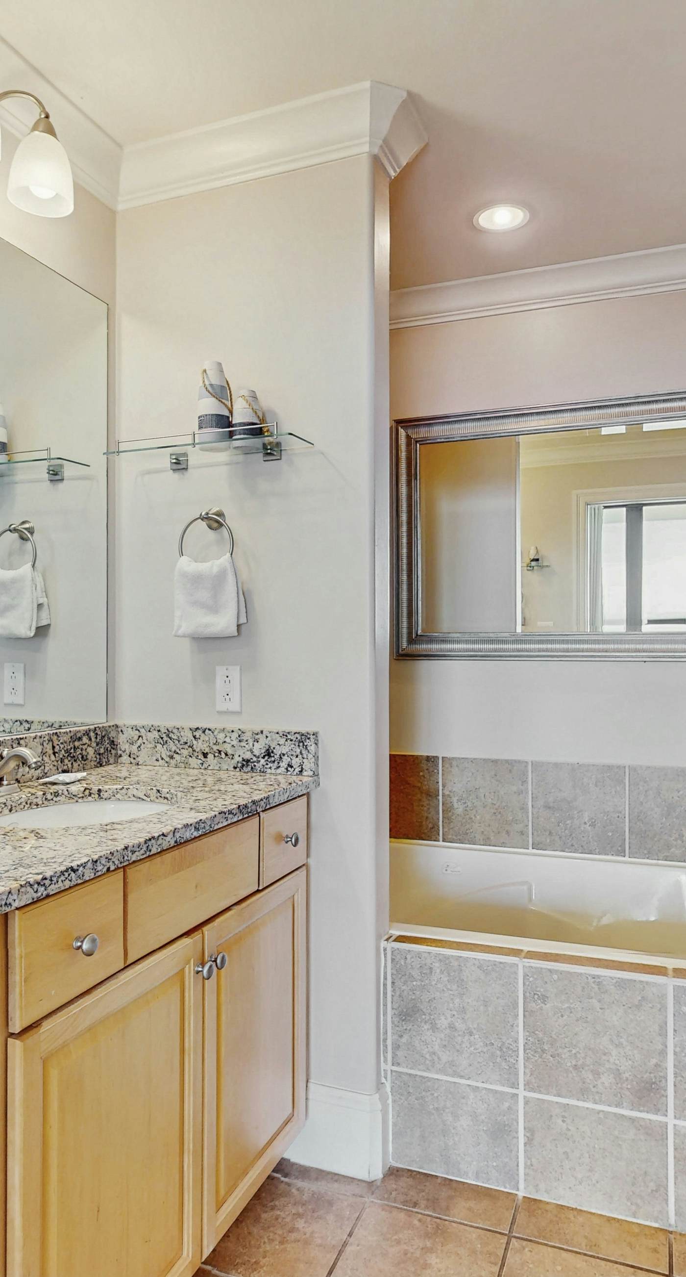 Bright & beachy waterfront condo with pools, tennis, gym, spacious balcony & W/D