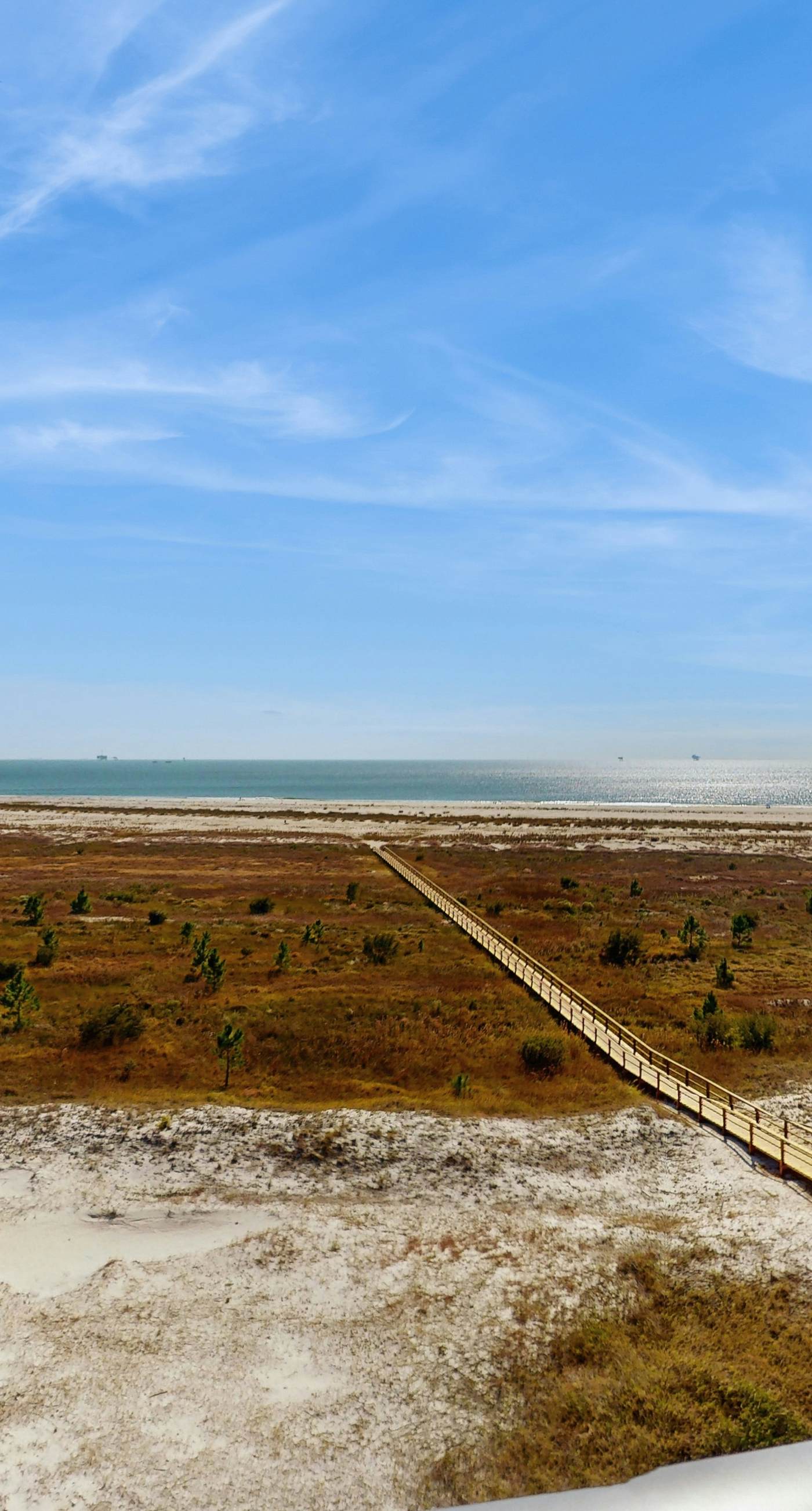 Bright & beachy waterfront condo with pools, tennis, gym, spacious balcony & W/D