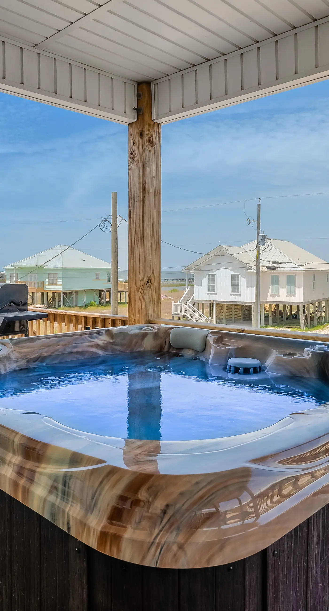 Beach house with Gulf views, deck, hot tub, new pool, grill, & WiFi