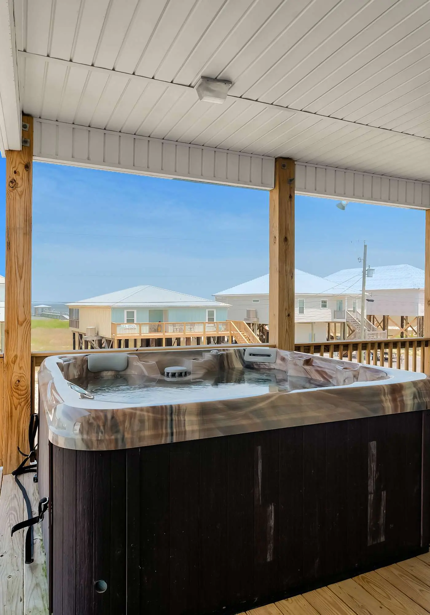 Beach house with Gulf views, deck, hot tub, new pool, grill, & WiFi