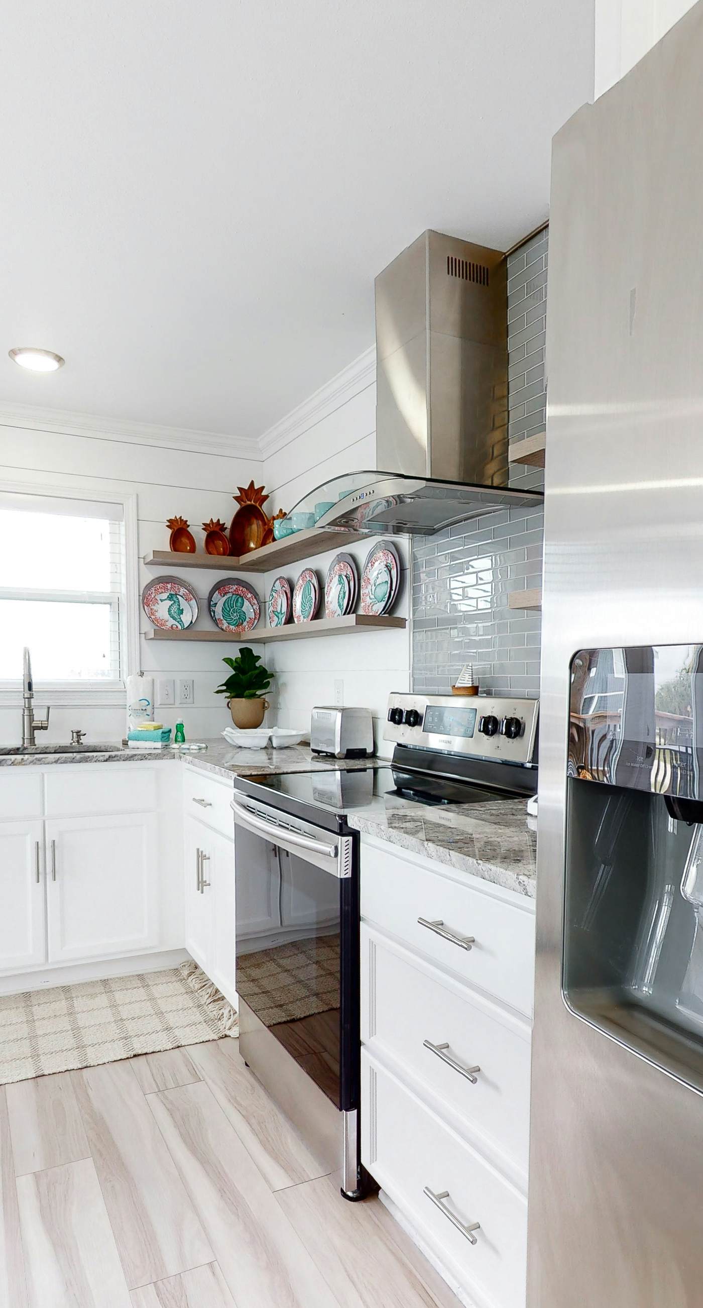 Bay view home with WiFi, central ac, & decks - snowbirds, dogs welcome