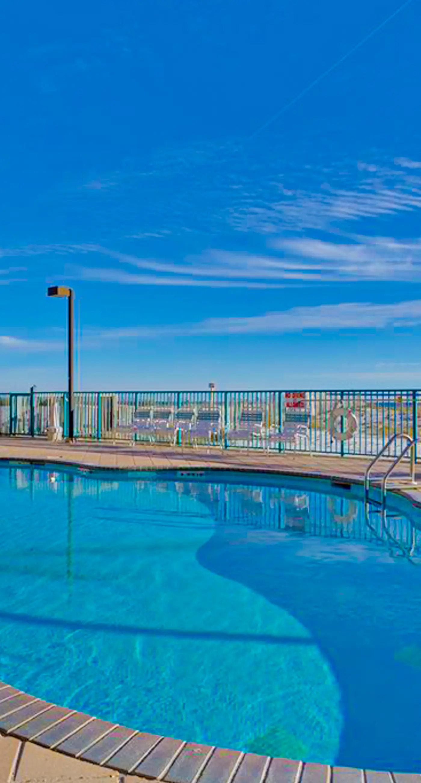 Gulf-front condo with central AC, balcony & pool