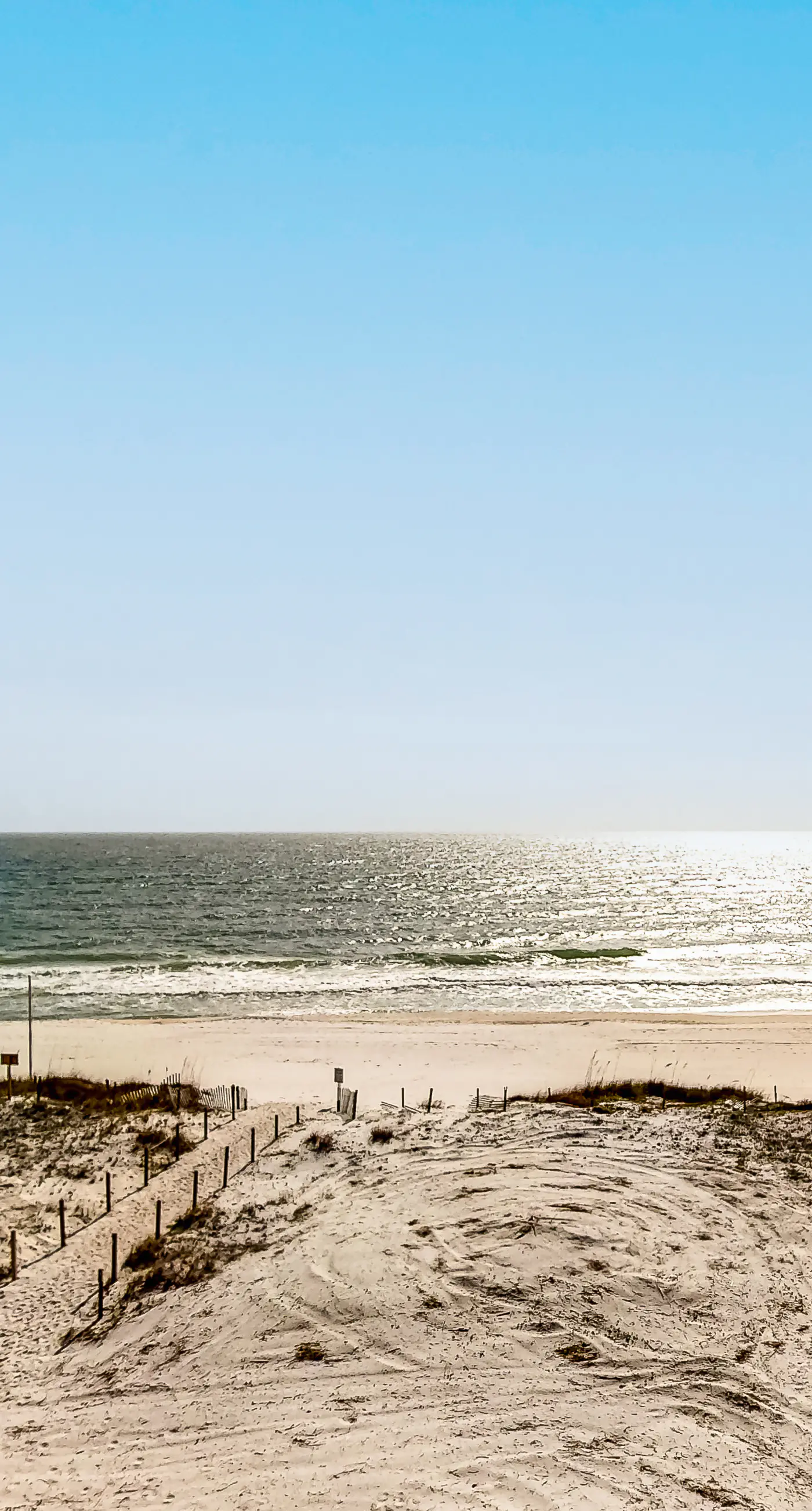 Fourth-floor Gulf-front getaway with balcony, views, central AC, & outdoor pool