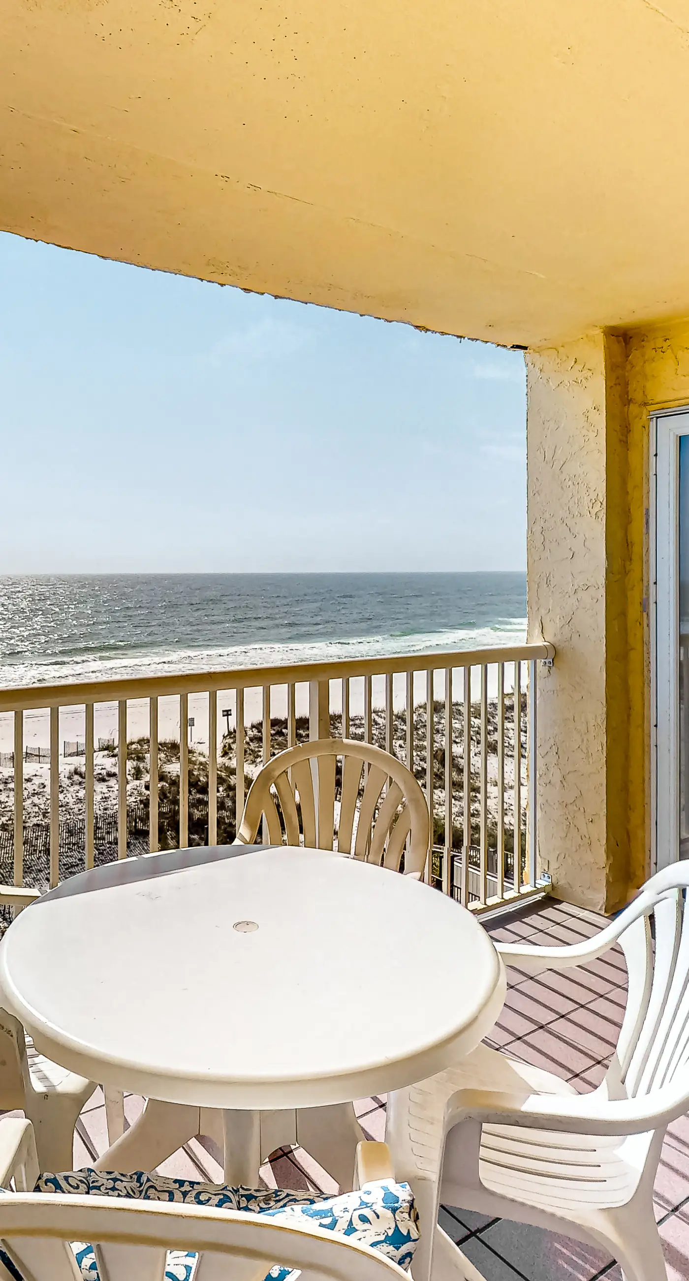 Fourth-floor Gulf-front getaway with balcony, views, central AC, & outdoor pool