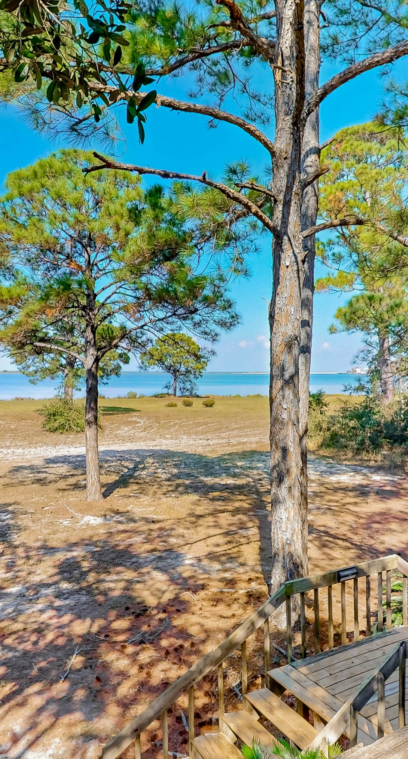 Bayfront home with Gulf views & deck with private swim spa - dog-friendly