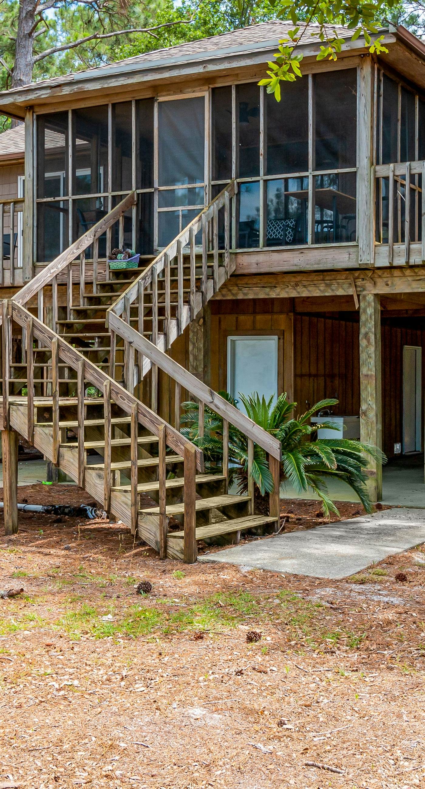 Bayfront home with Gulf views & deck with private swim spa - dog-friendly