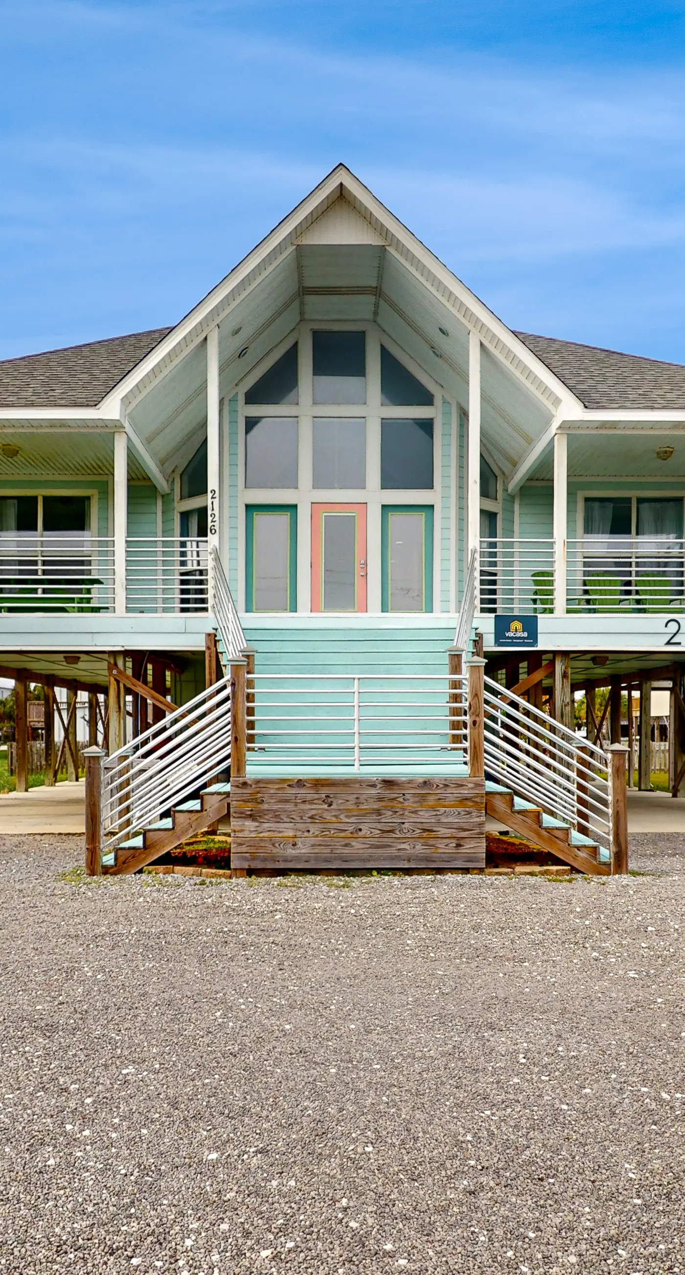 Two-story, dog-friendly home with partial ocean views, decks, private washer,dryer