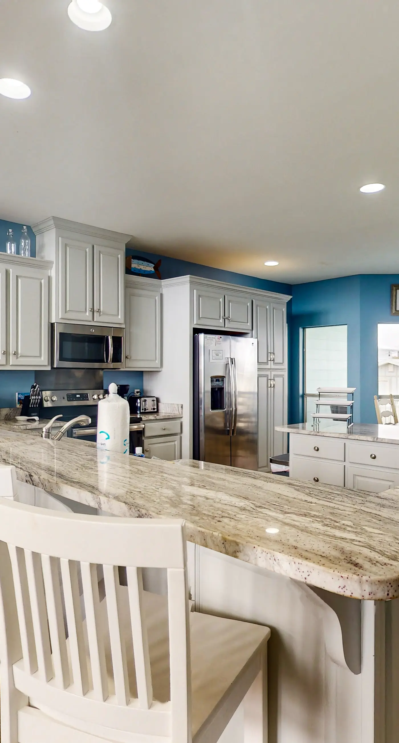 Two-story, dog-friendly home with partial ocean views, decks, private washer,dryer