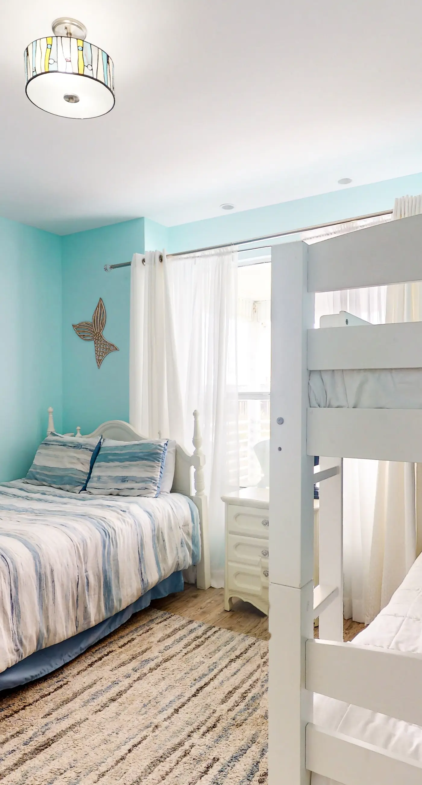 Two-story, dog-friendly home with partial ocean views, decks, private washer,dryer