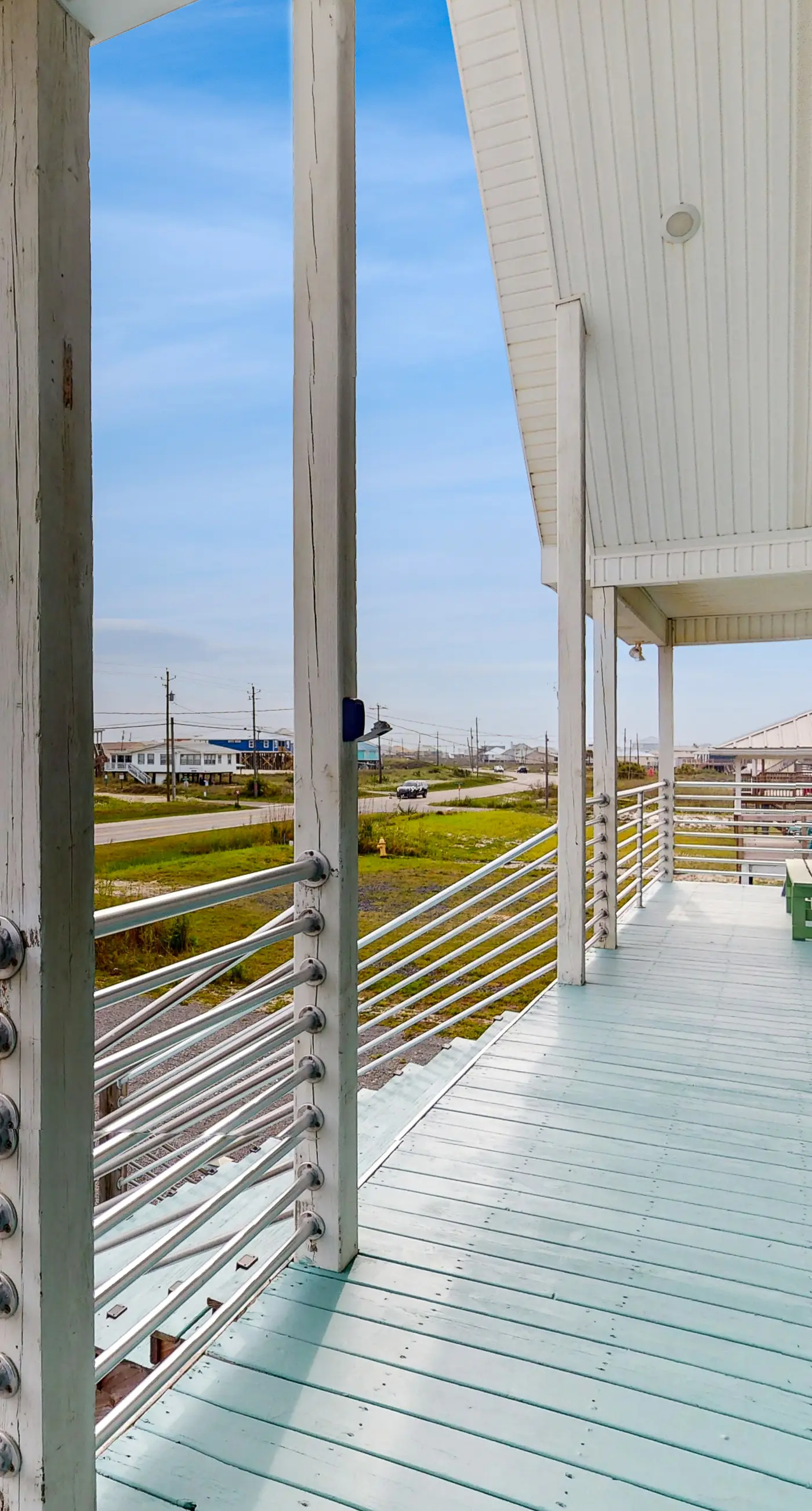 Two-story, dog-friendly home with partial ocean views, decks, private washer,dryer