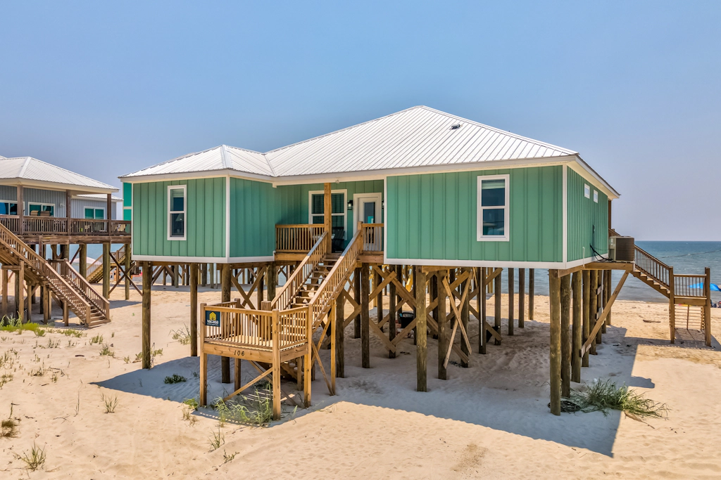 Exquisite oceanfront beach home with hot tub, central AC, balcony, & W&D