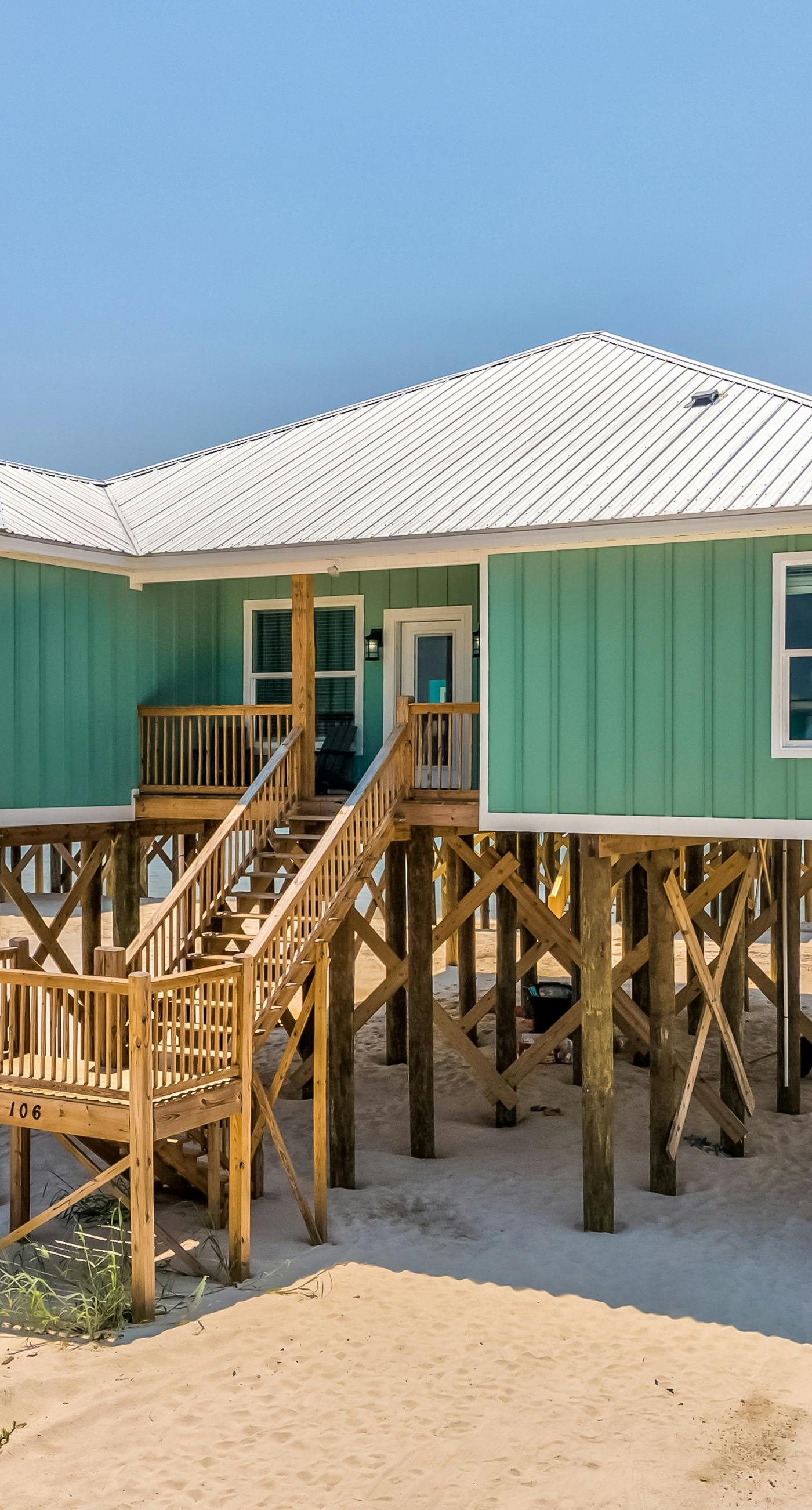 Exquisite oceanfront beach home with hot tub, central AC, balcony, & W&D