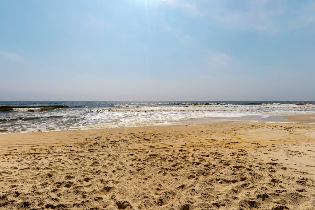 Exquisite oceanfront beach home with hot tub, central AC, balcony, & W&D