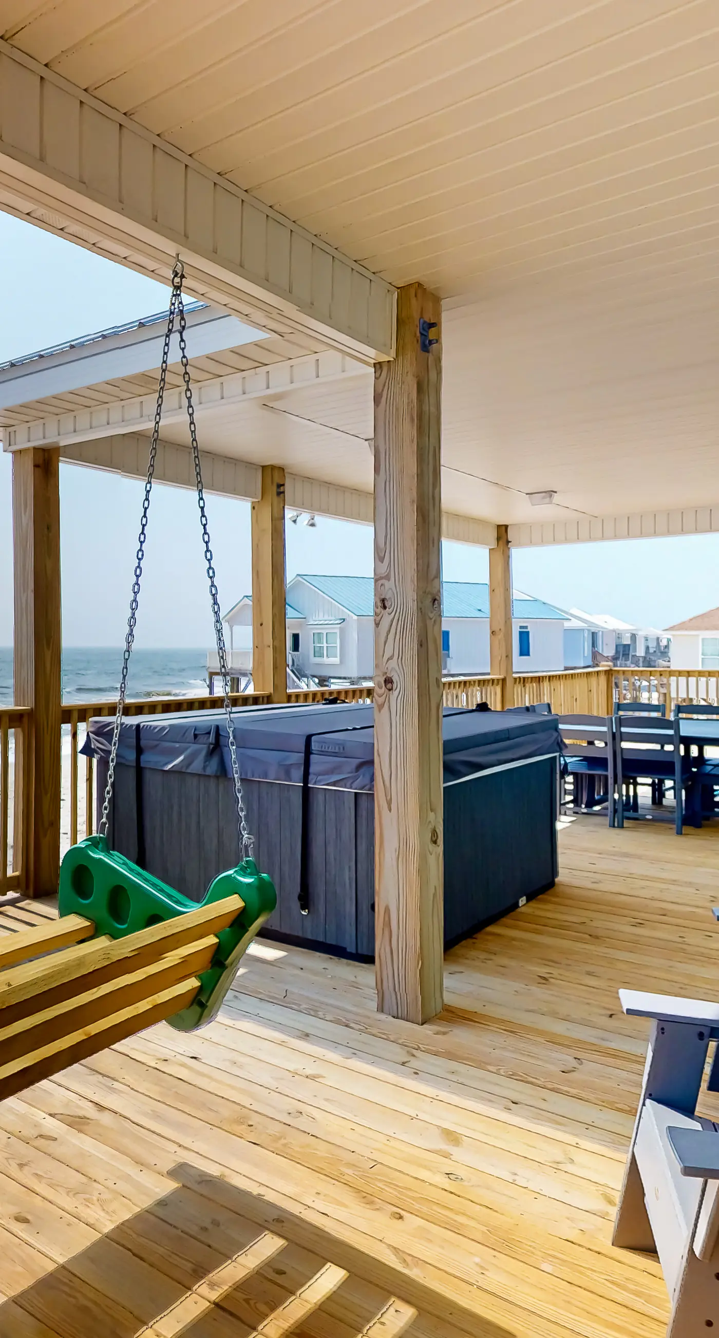 Exquisite oceanfront beach home with hot tub, central AC, balcony, & W&D