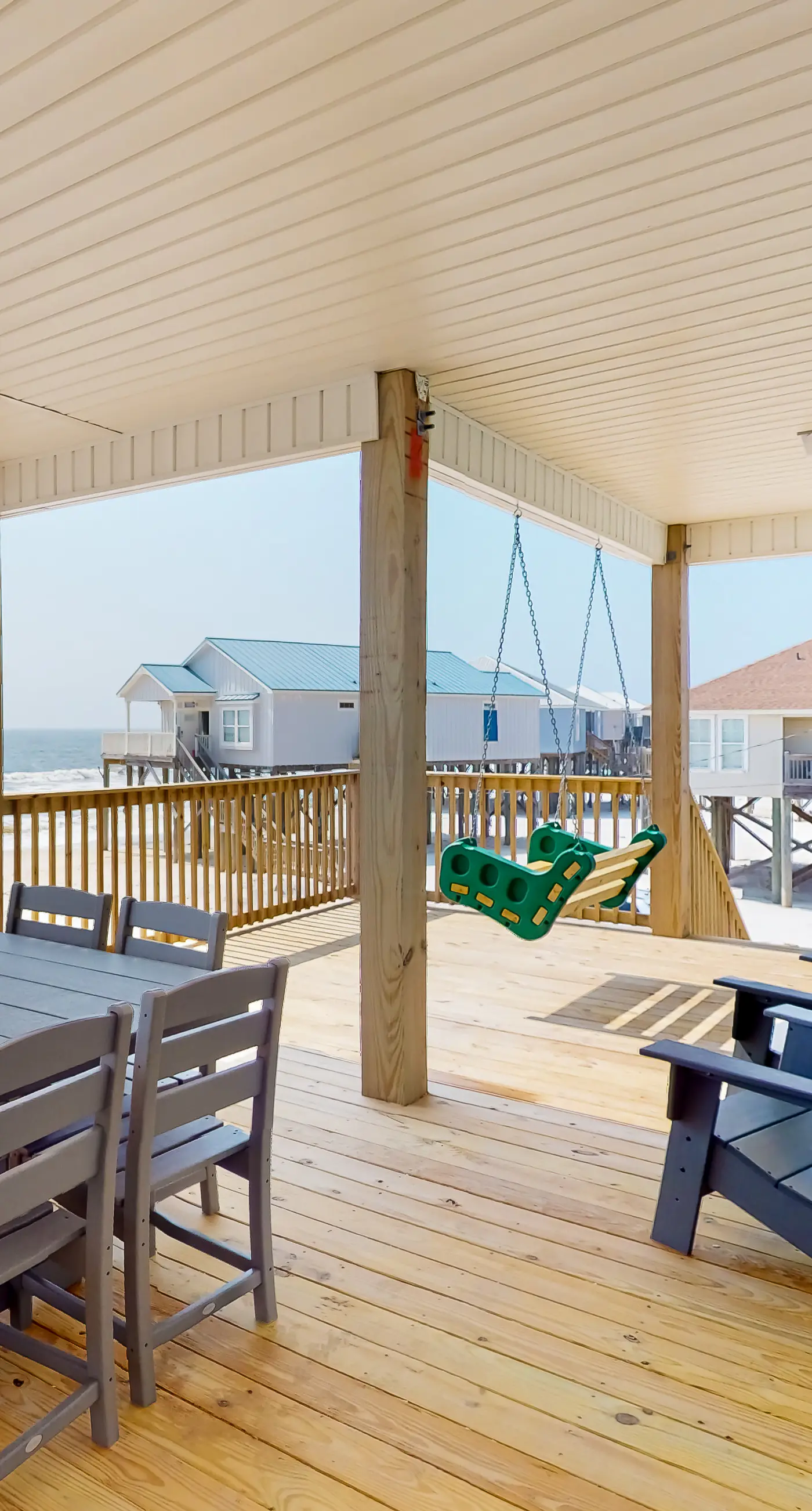 Exquisite oceanfront beach home with hot tub, central AC, balcony, & W&D