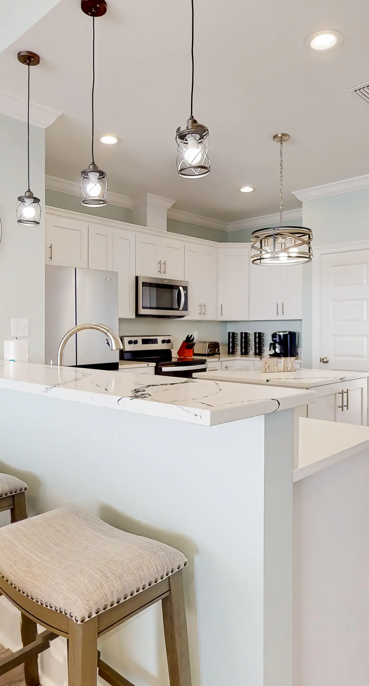 Exquisite oceanfront beach home with hot tub, central AC, balcony, & W&D