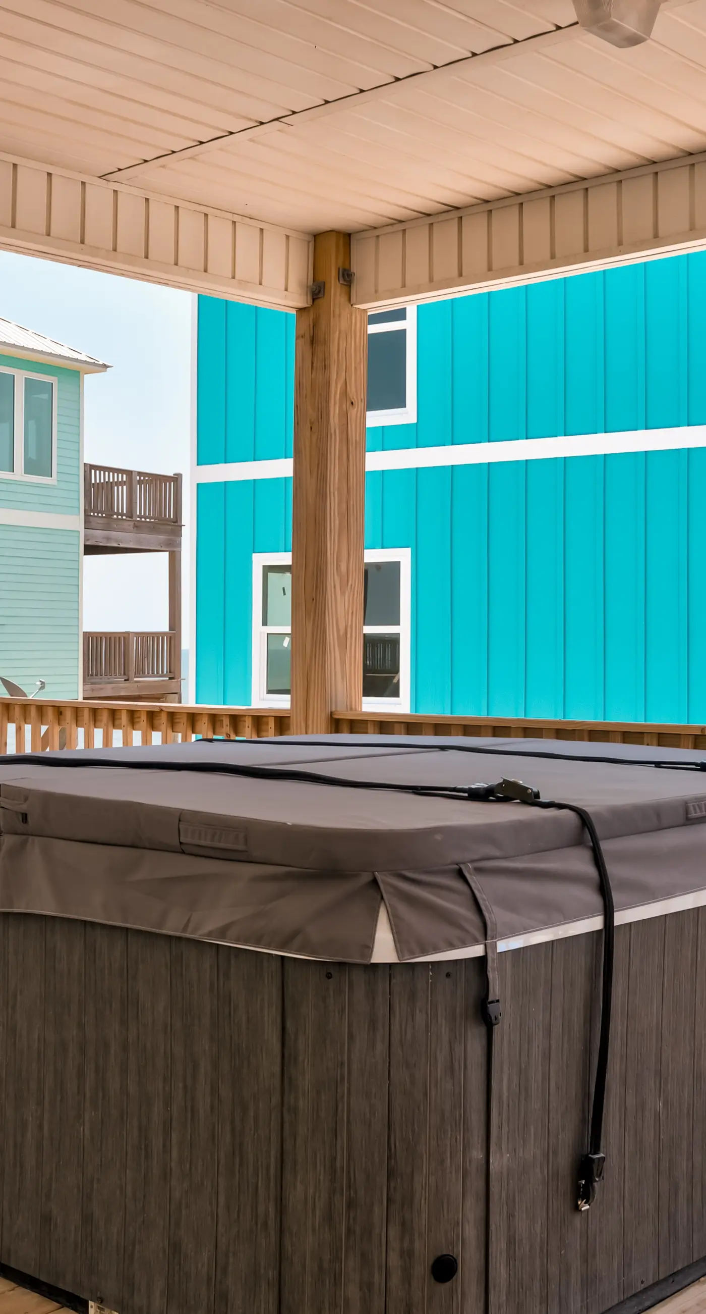 Exquisite oceanfront beach home with hot tub, central AC, balcony, & W&D