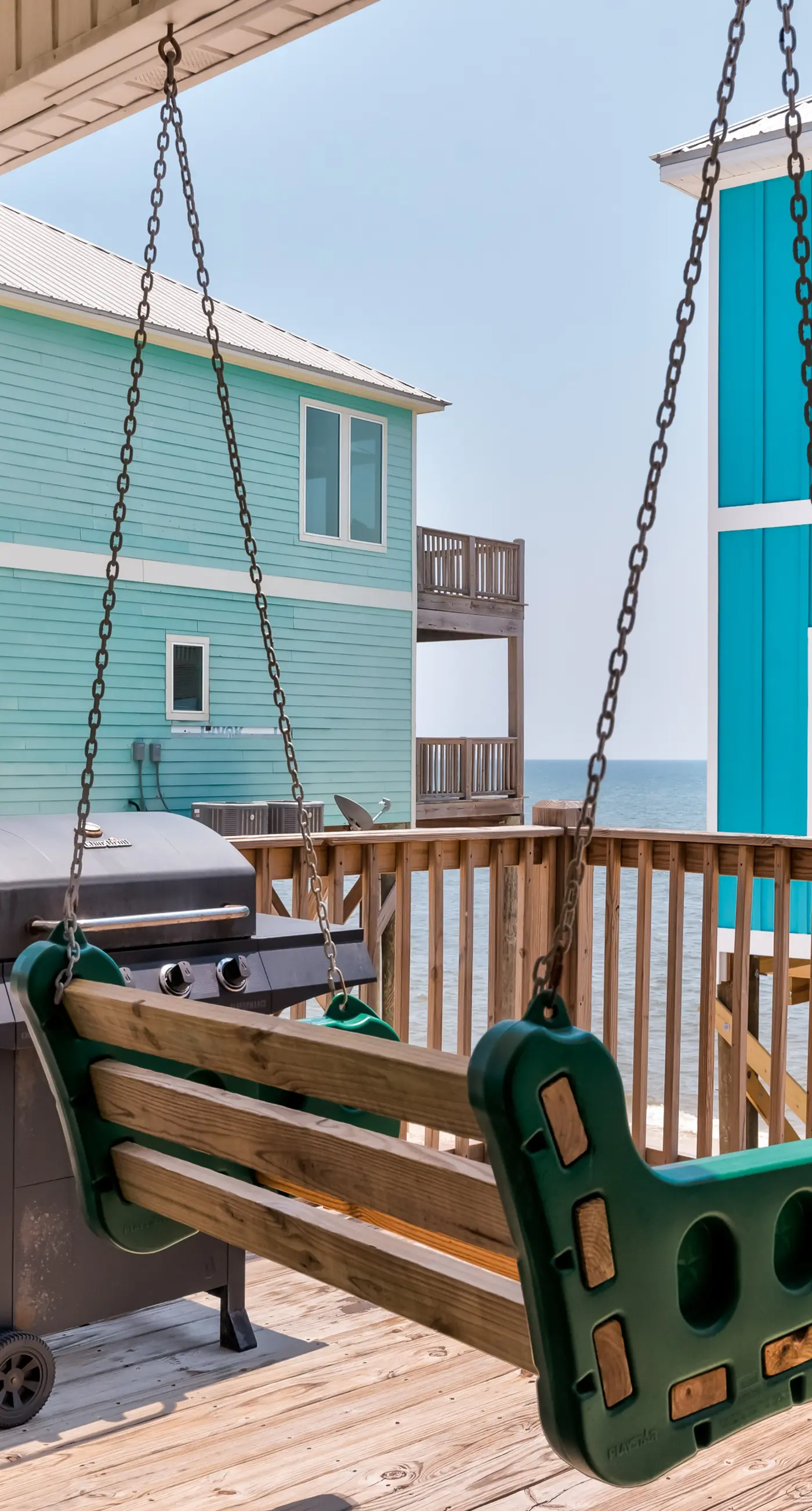 Exquisite oceanfront beach home with hot tub, central AC, balcony, & W&D