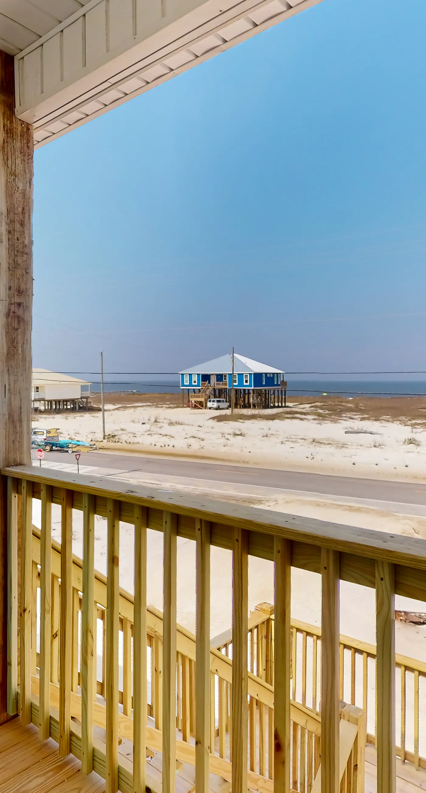 Exquisite oceanfront beach home with hot tub, central AC, balcony, & W&D