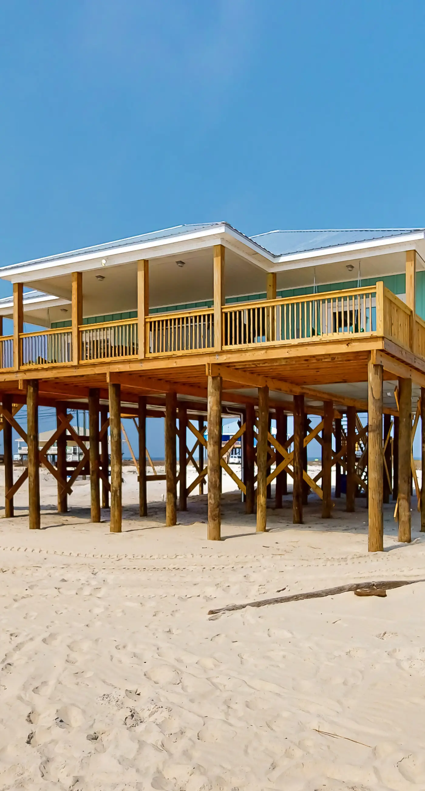 Exquisite oceanfront beach home with hot tub, central AC, balcony, & W&D