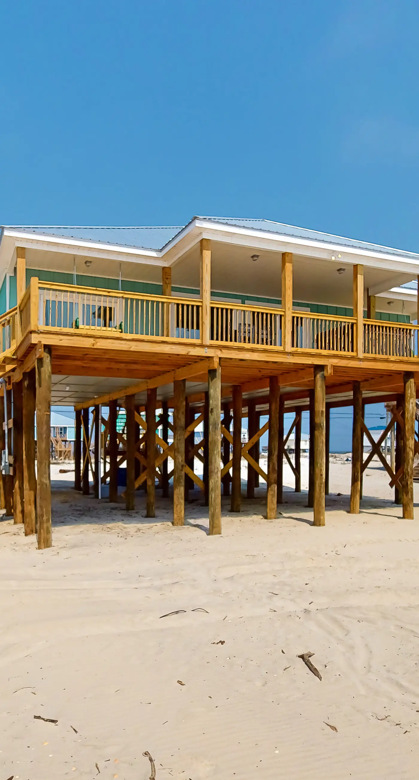 Exquisite oceanfront beach home with hot tub, central AC, balcony, & W&D