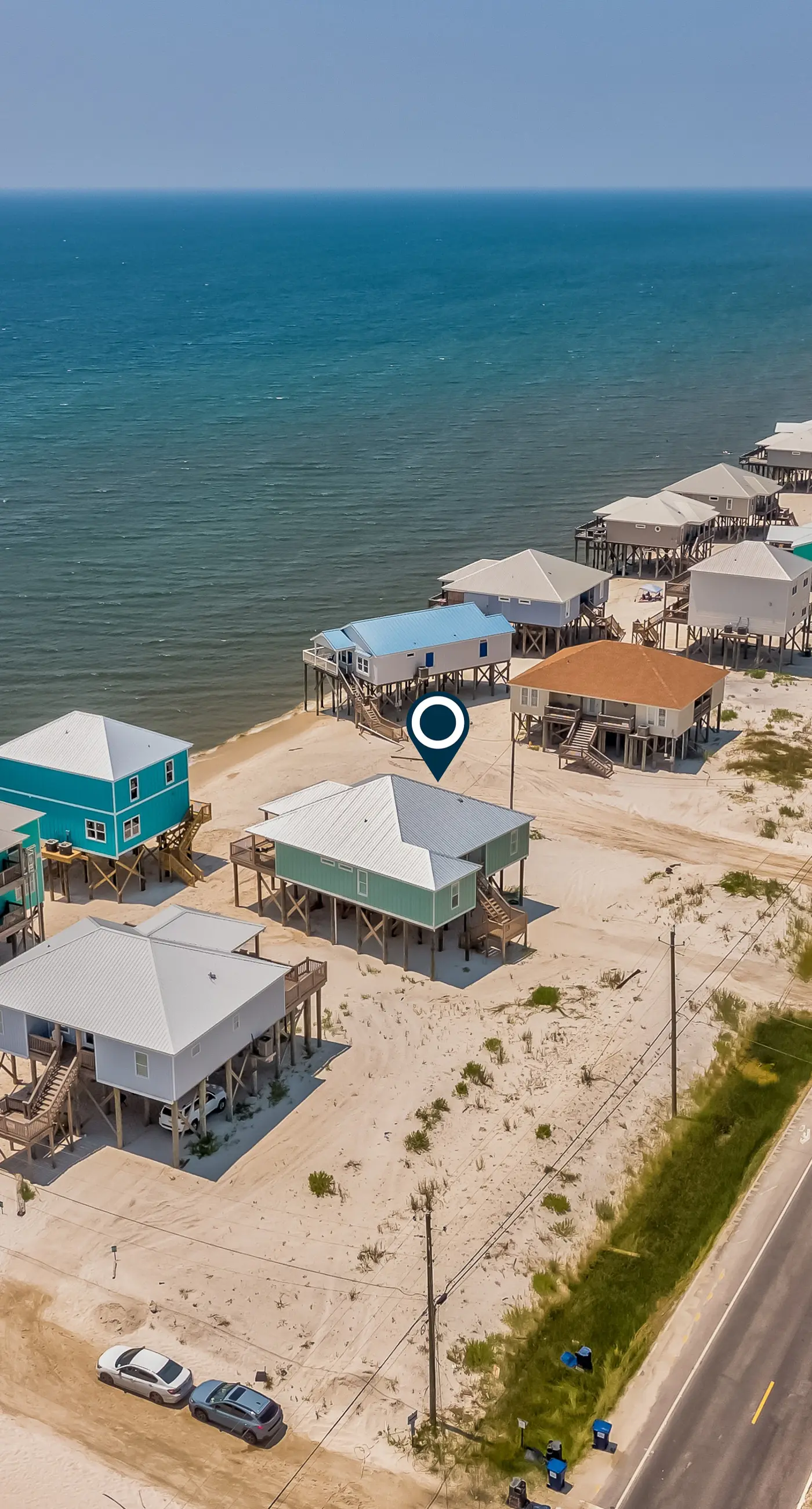 Exquisite oceanfront beach home with hot tub, central AC, balcony, & W&D