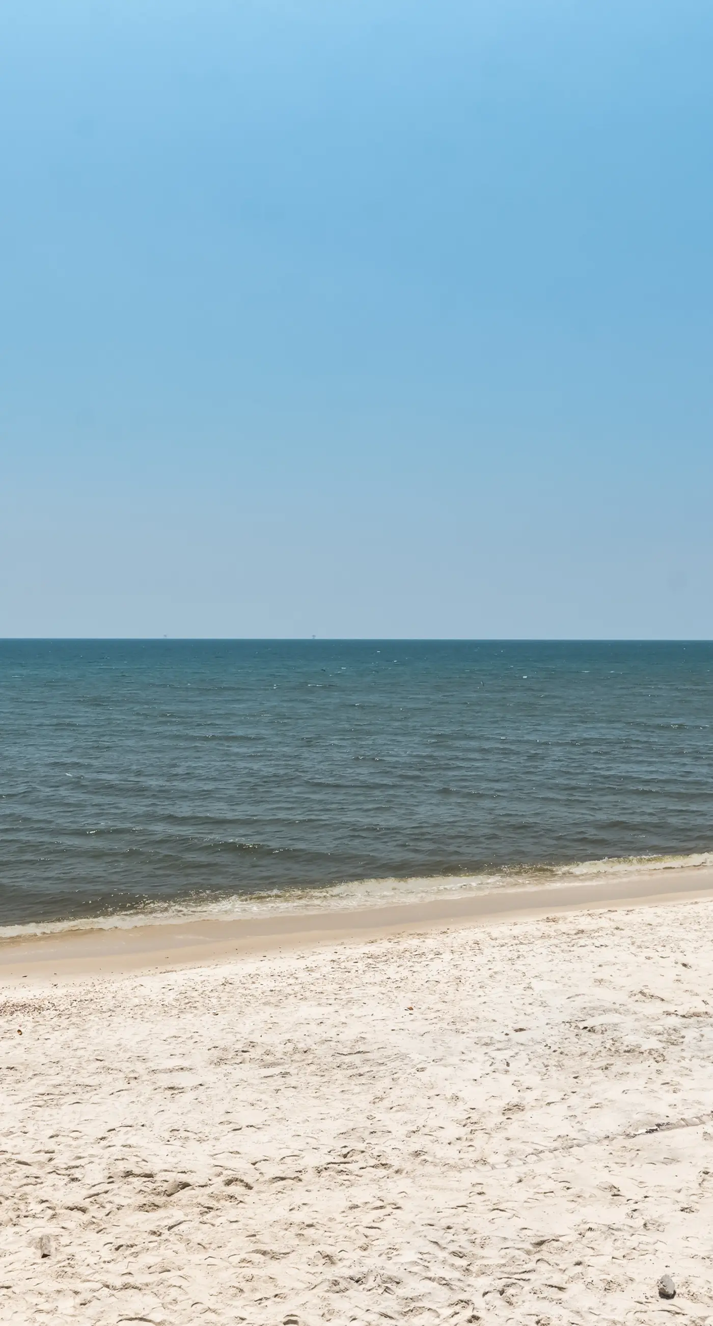 Exquisite oceanfront beach home with hot tub, central AC, balcony, & W&D