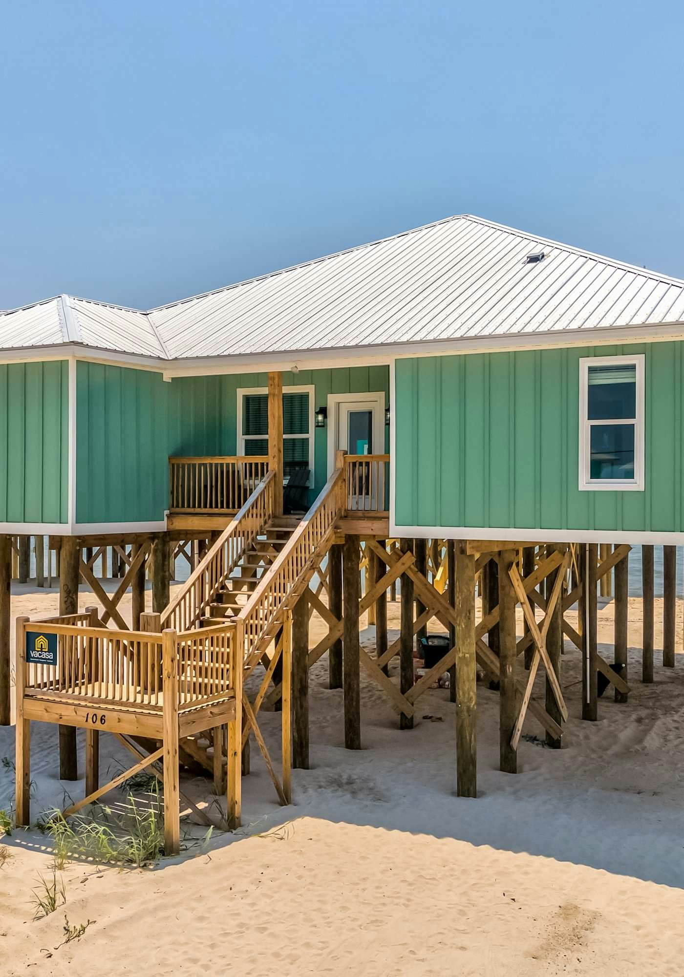 Exquisite oceanfront beach home with hot tub, central AC, balcony, & W&D
