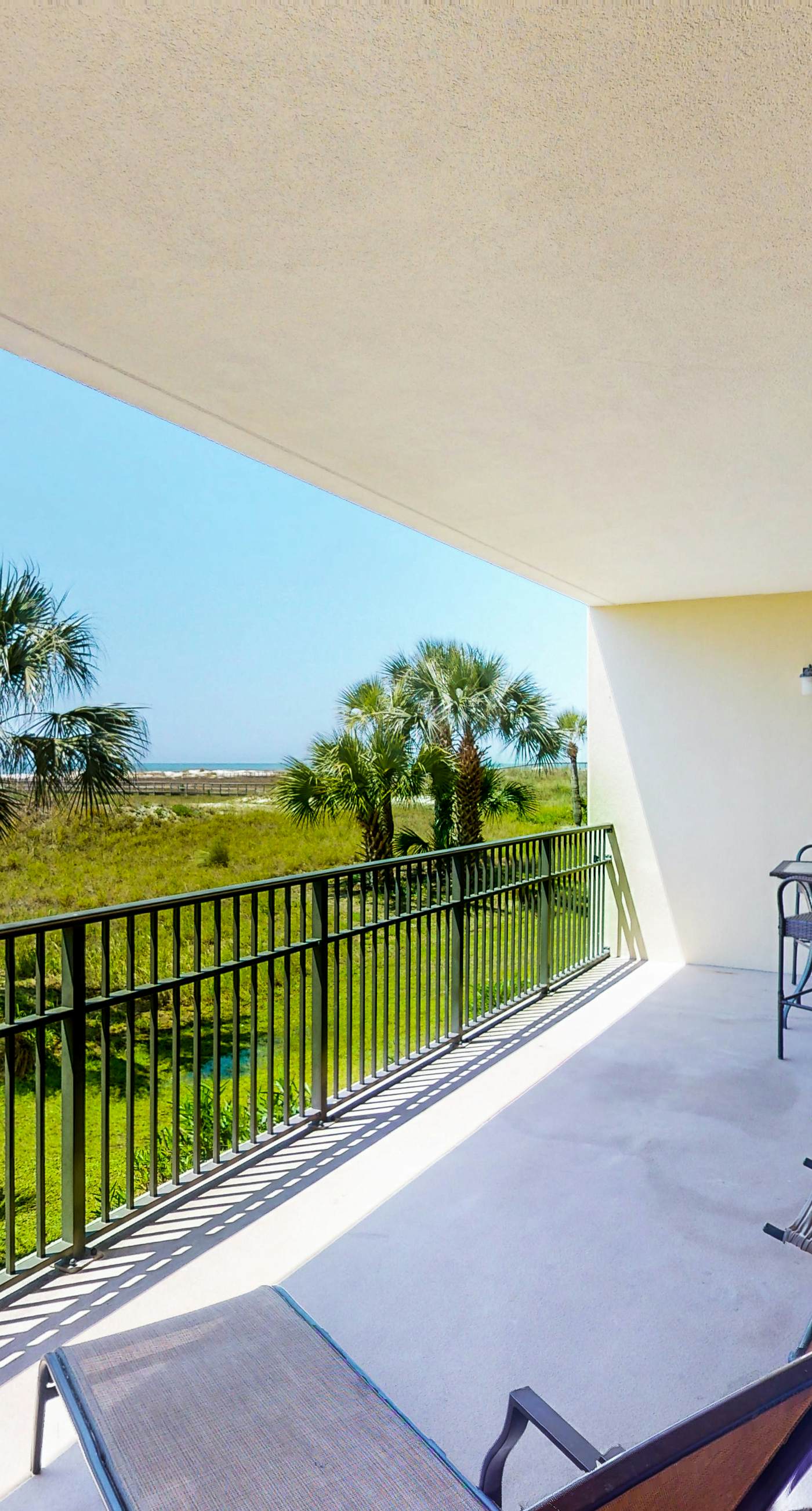 Beachfront condo with pool, hot tub, W/D, sauna, balcony, and tennis court