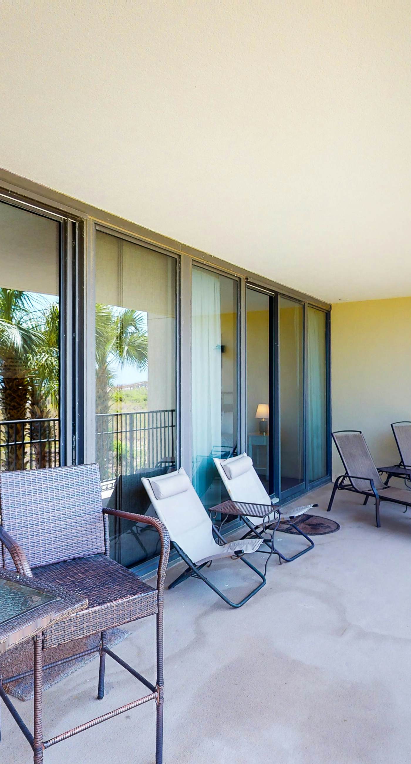 Beachfront condo with pool, hot tub, W/D, sauna, balcony, and tennis court